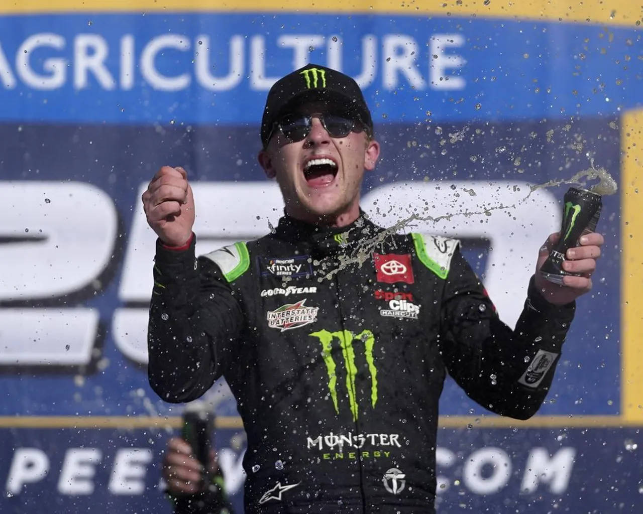 Ty Gibbs Celebrating With Monster Energy Background