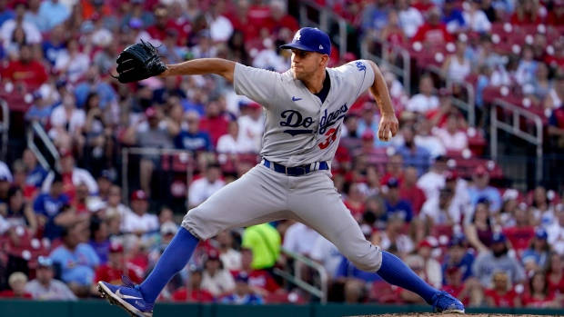 Tyler Anderson In Wide Pitching Stance Background