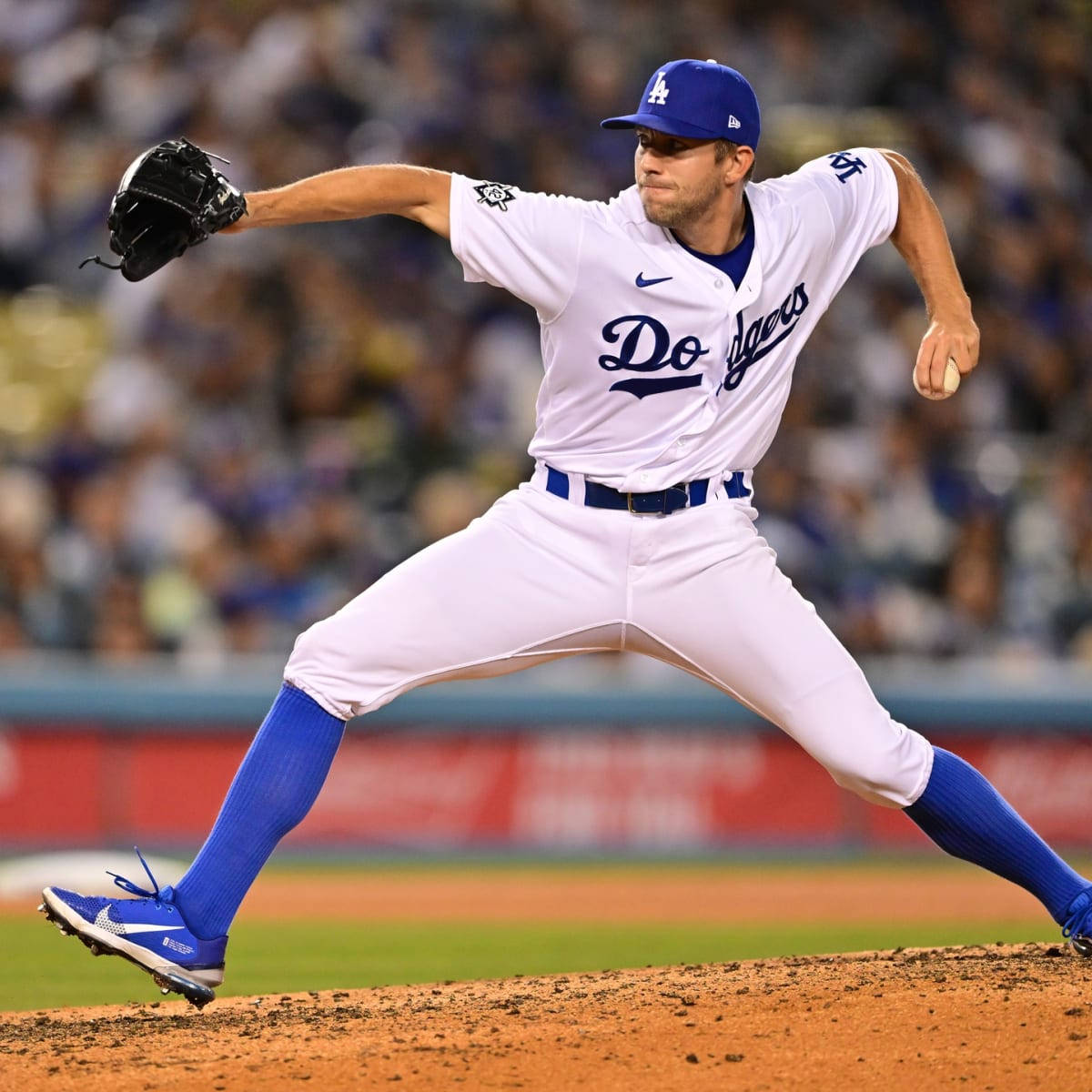 Tyler Anderson Throwing Baseball For Dodgers Background