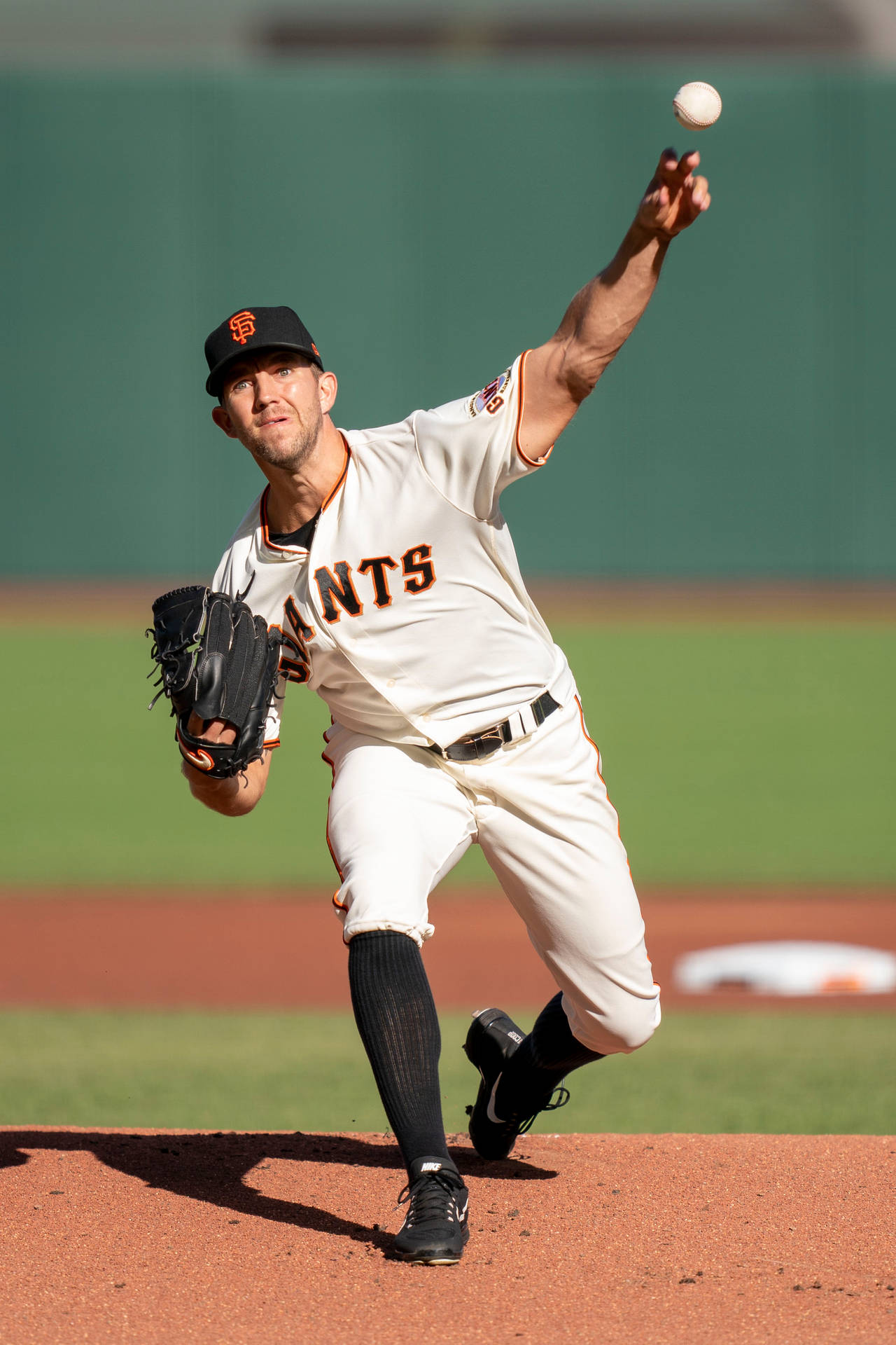 Tyler Anderson Throwing For Giants Background