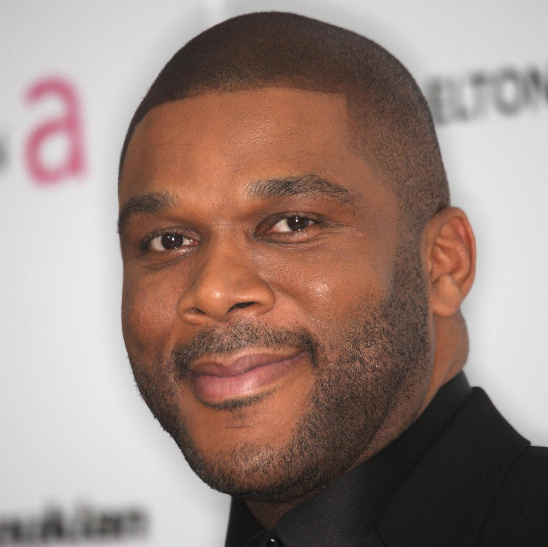 Tyler Perry Closed Mouth Smile Background