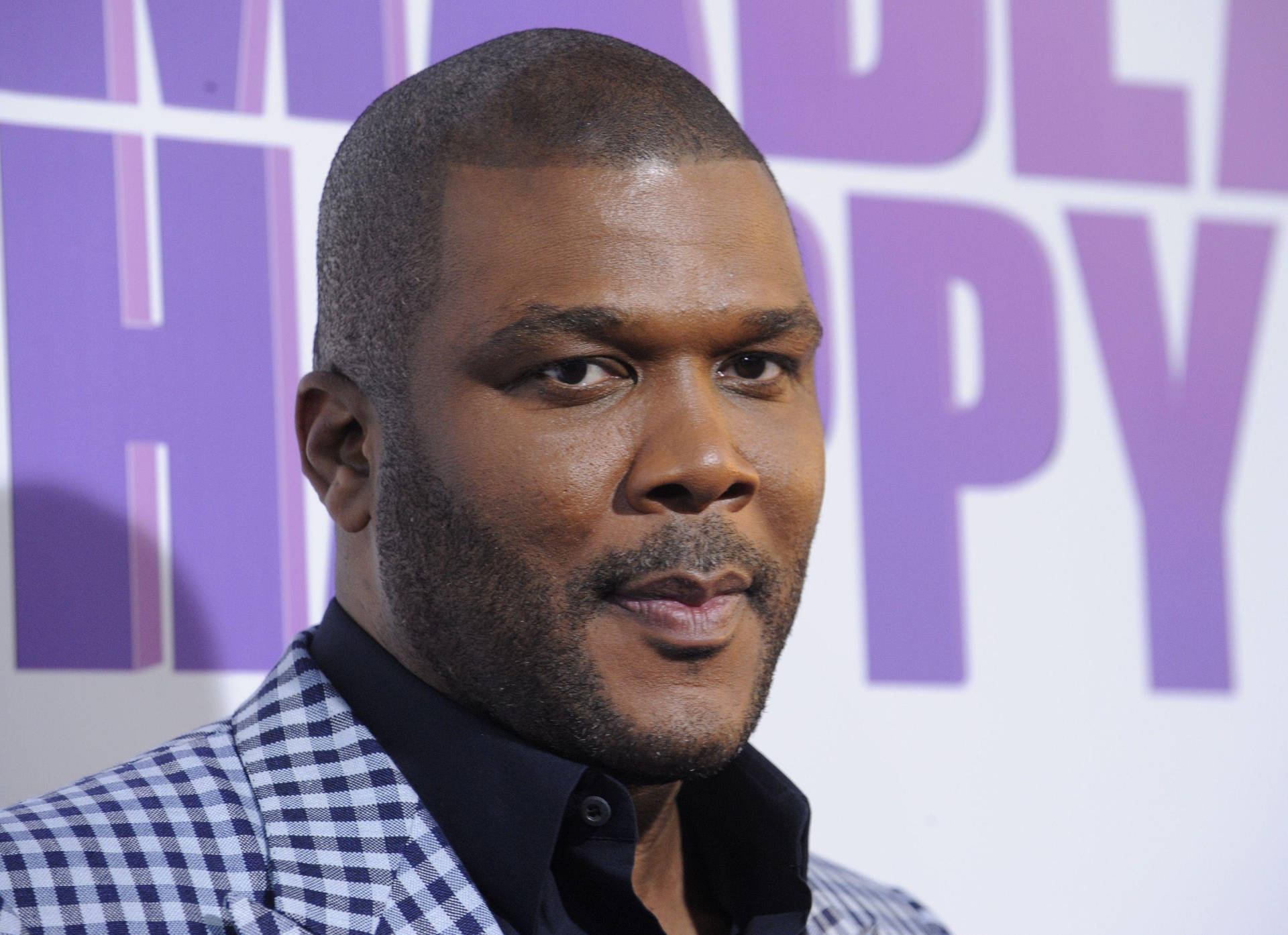 Tyler Perry Flaunting His Dapper Look Background