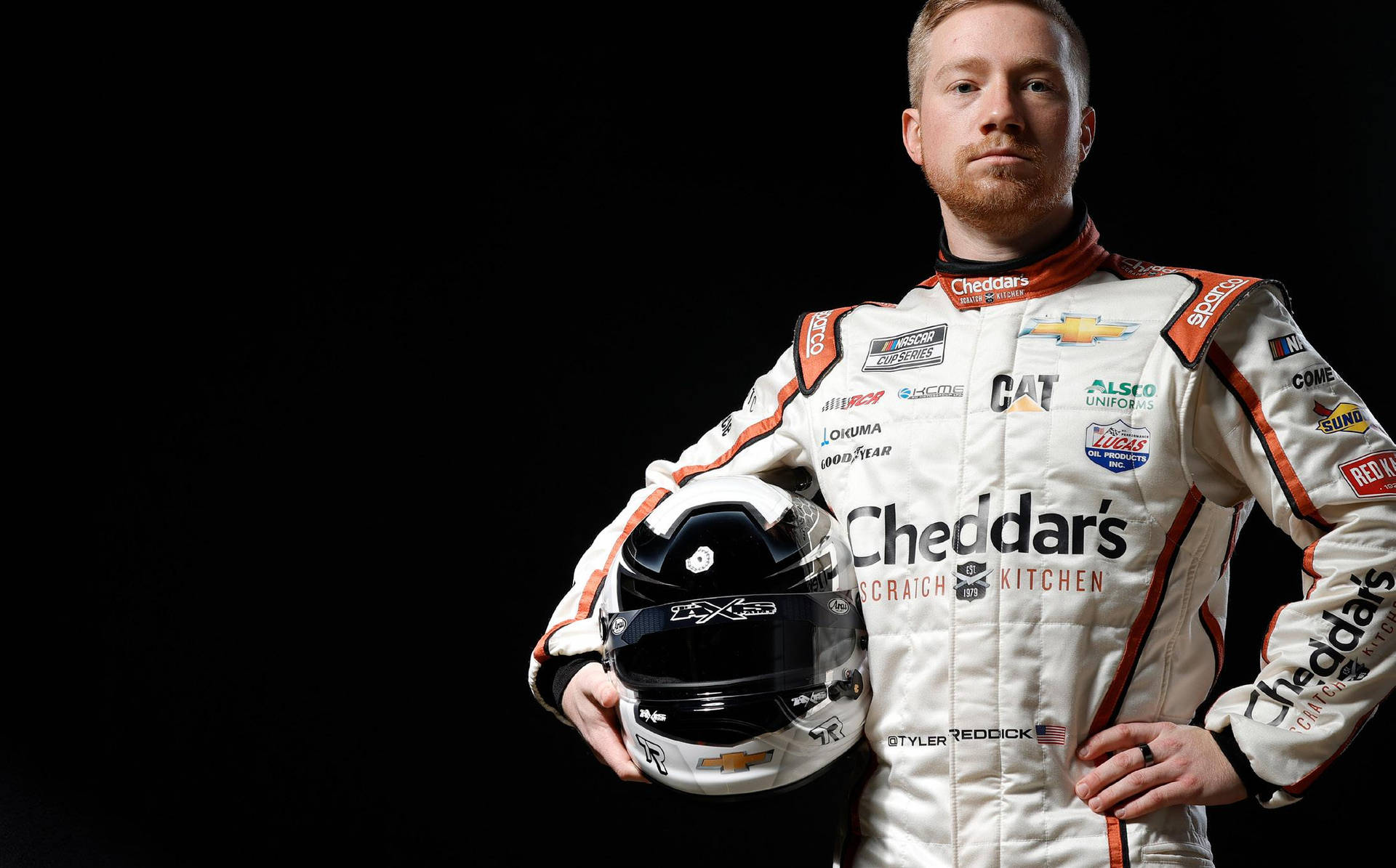 Tyler Reddick Holding His Helmet