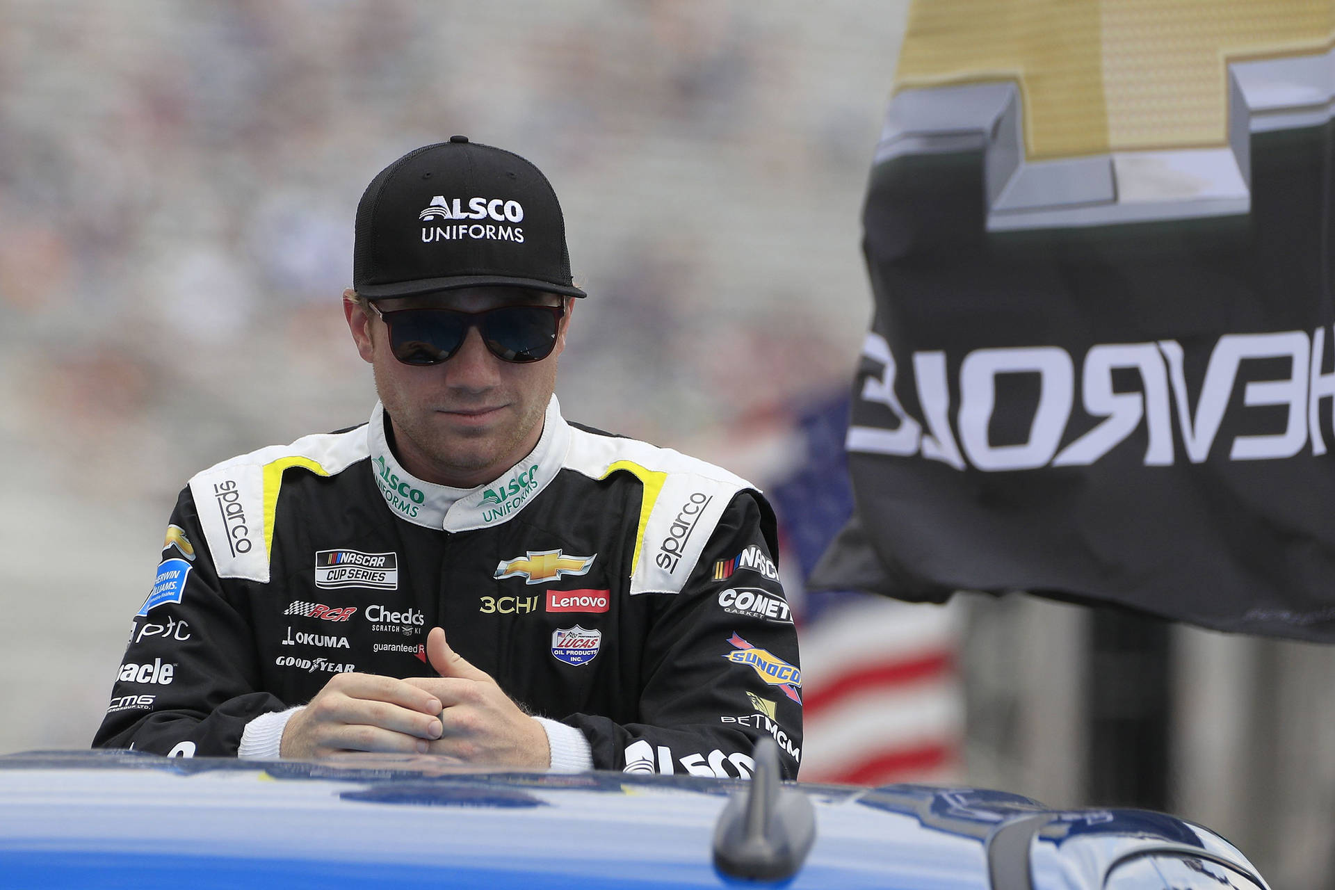 Tyler Reddick Leaning On A Car