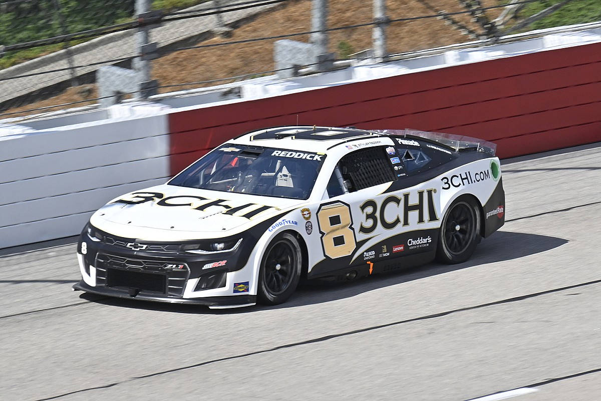 Tyler Reddick Racing In His Signature White Race Car