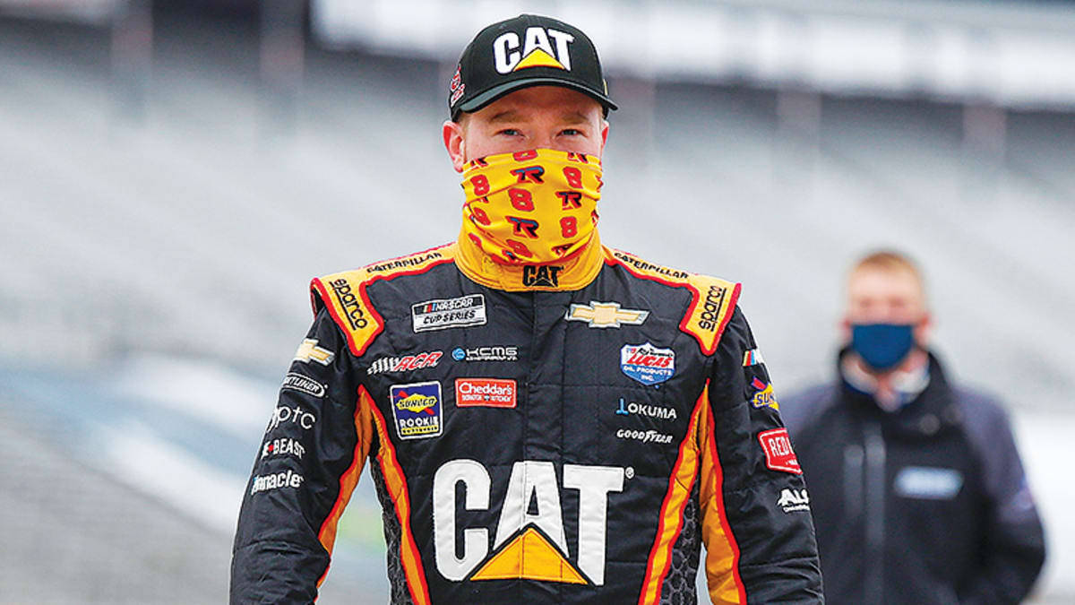 Tyler Reddick With A Yellow Mask Background