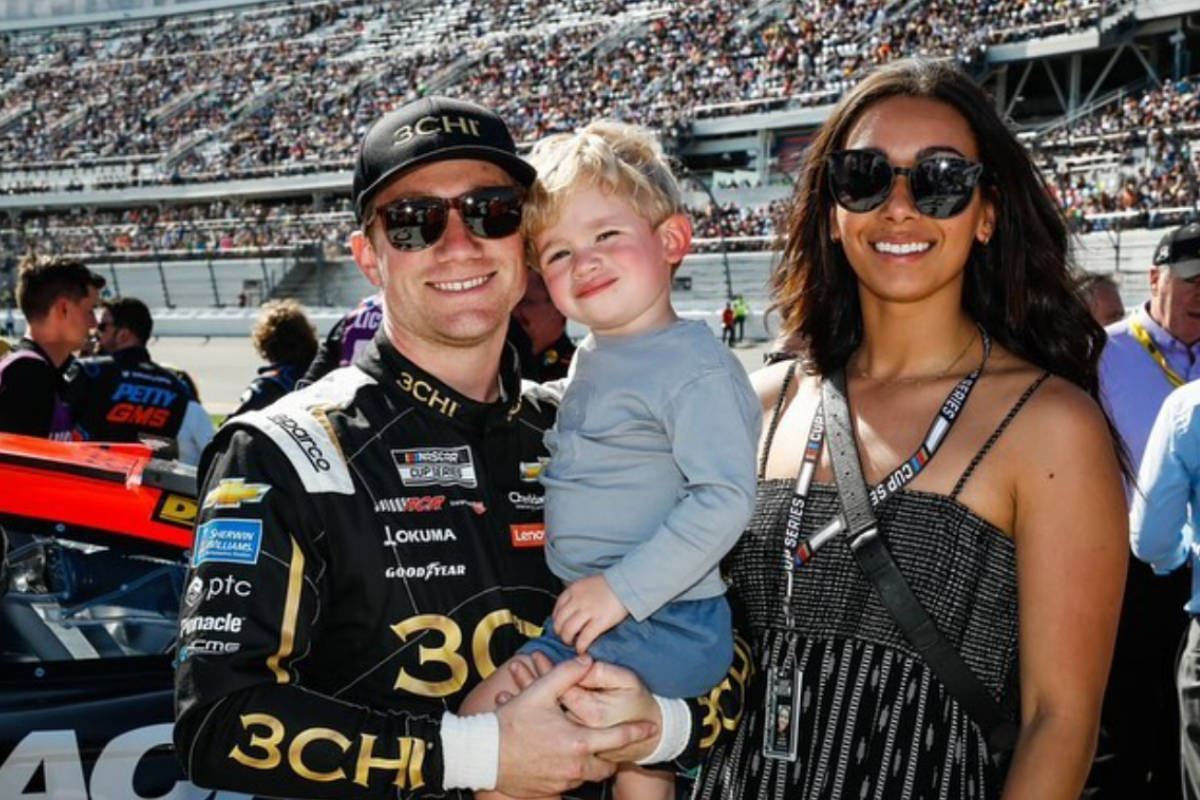 Tyler Reddick With Wife And Child Background