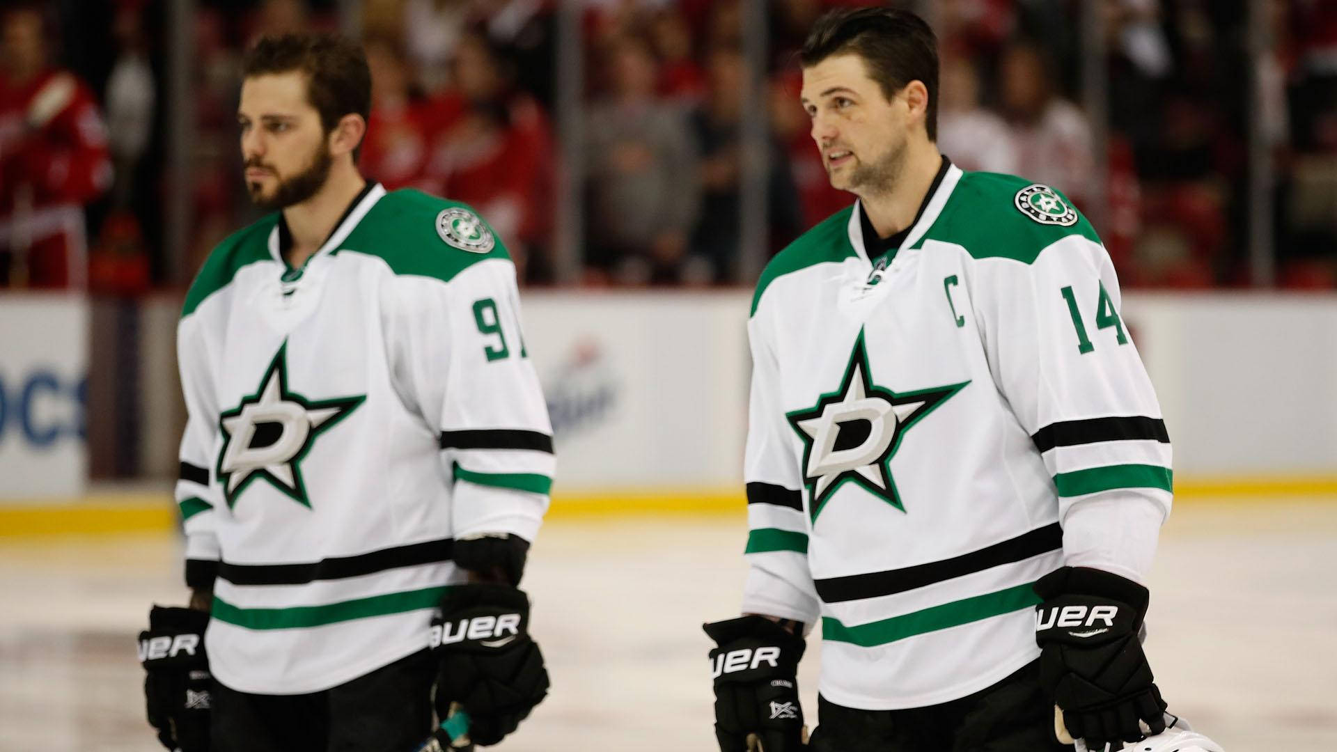 Tyler Seguin And Jamie Benn White Uniform Background