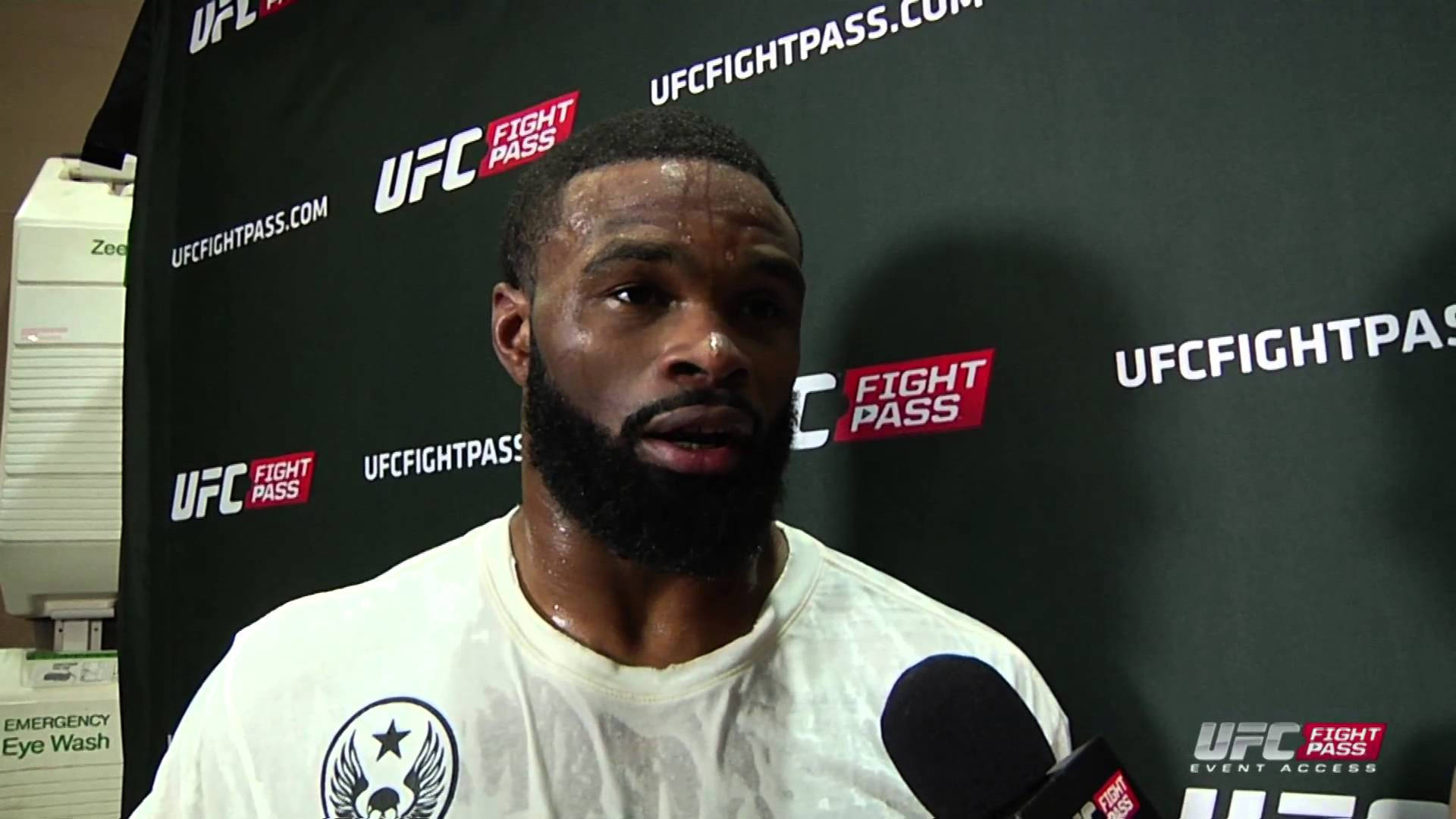 Tyron Woodley In White Shirt Background