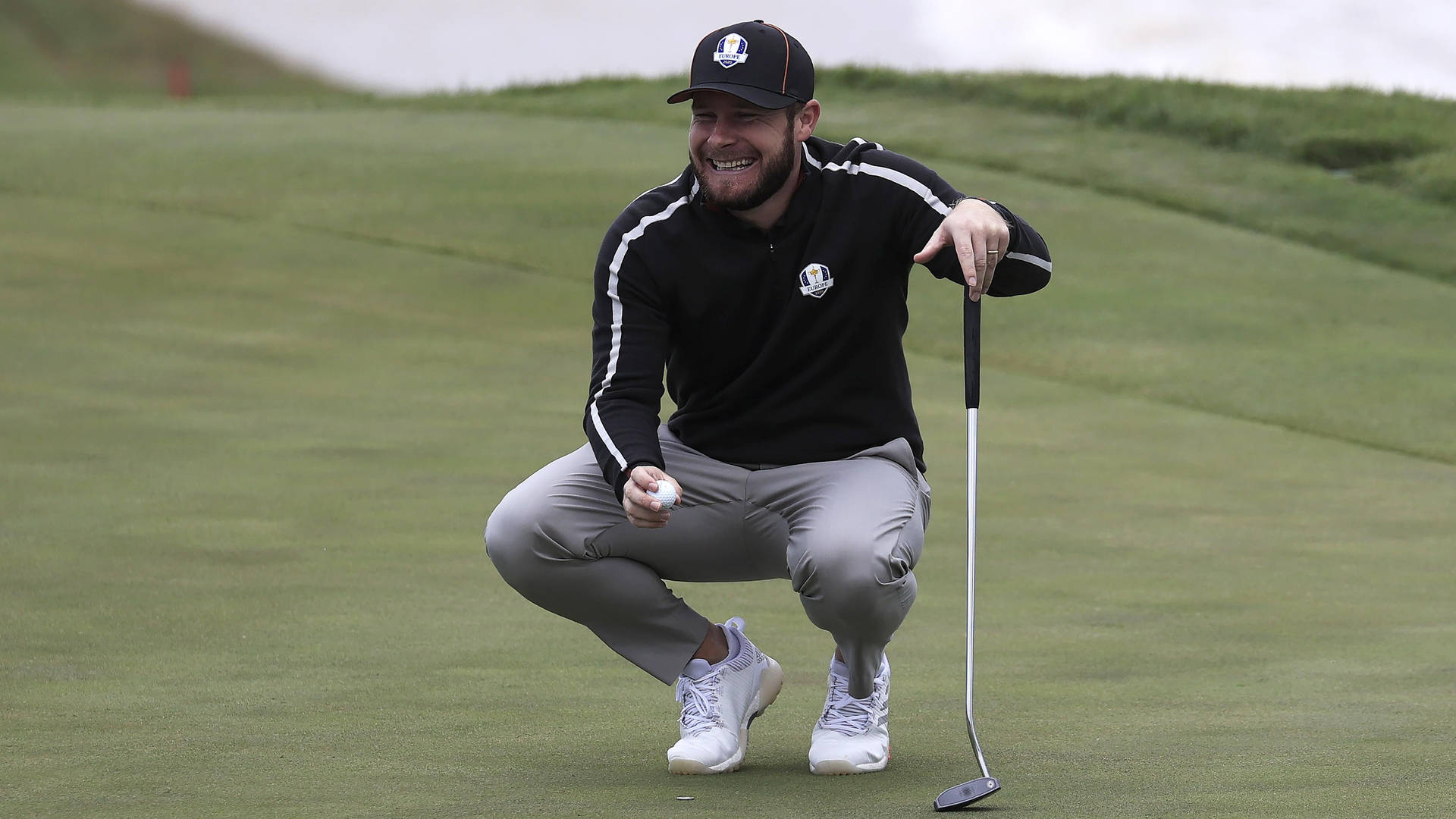 Tyrrell Hatton In Action At A Professional Golf Tournament.