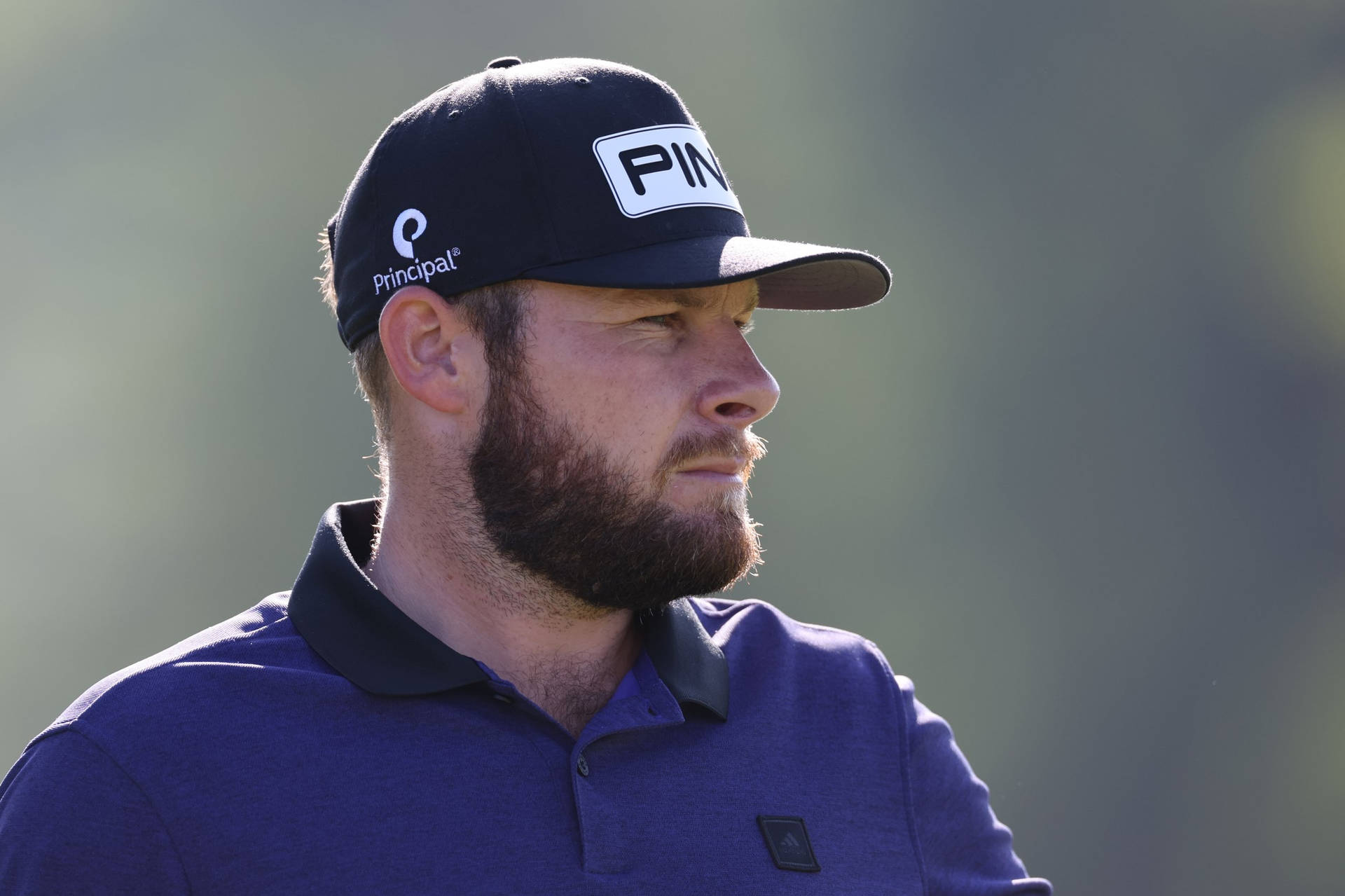 Tyrrell Hatton Swinging In Action On The Golf Course