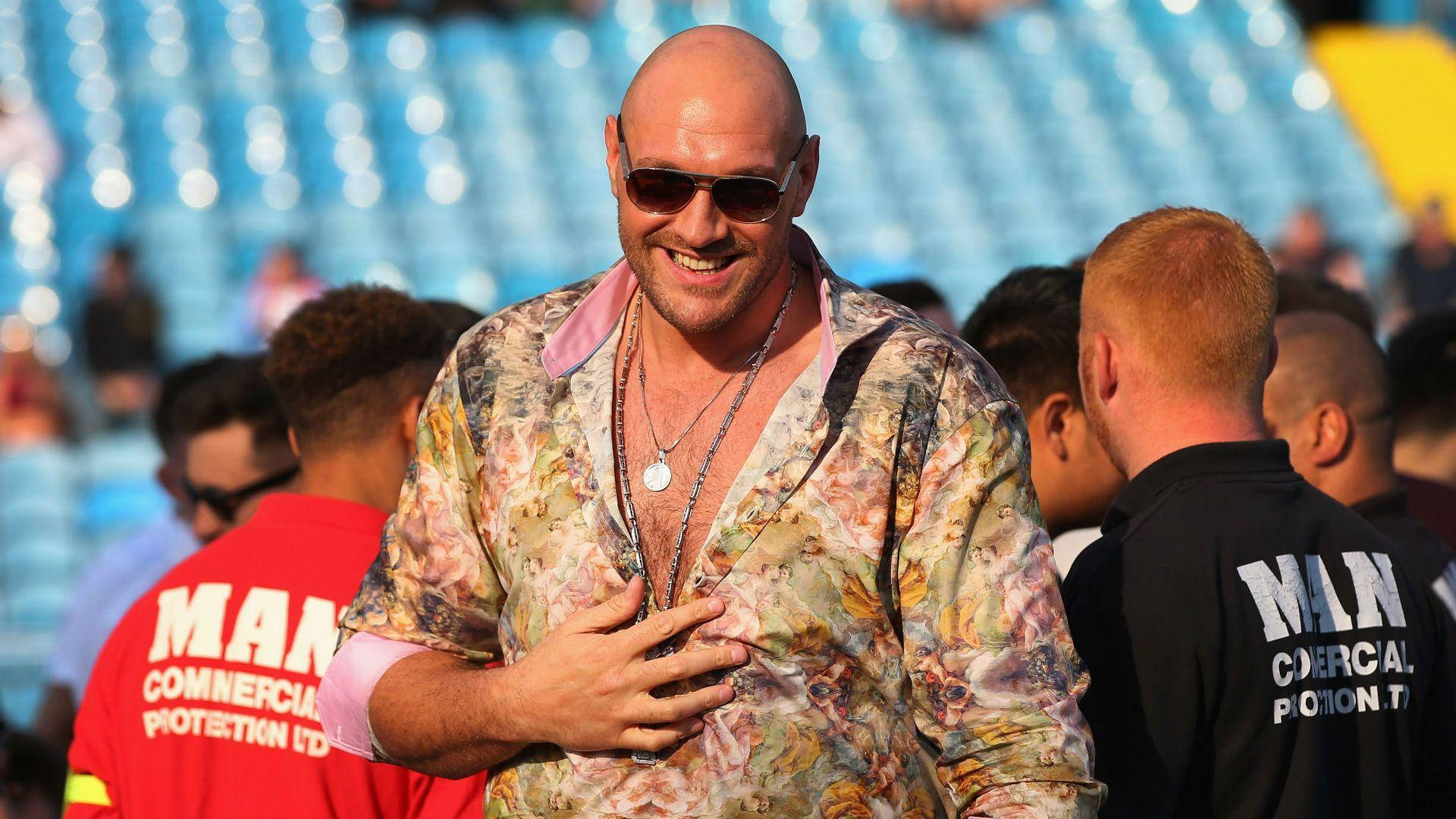 Tyson Fury As Cheerful Person Background
