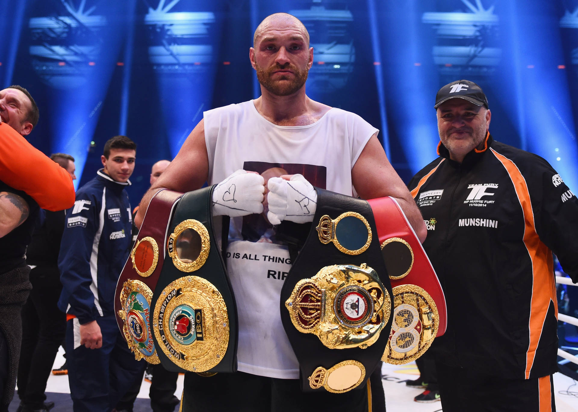 Tyson Fury Displays His Boxing Belts Background