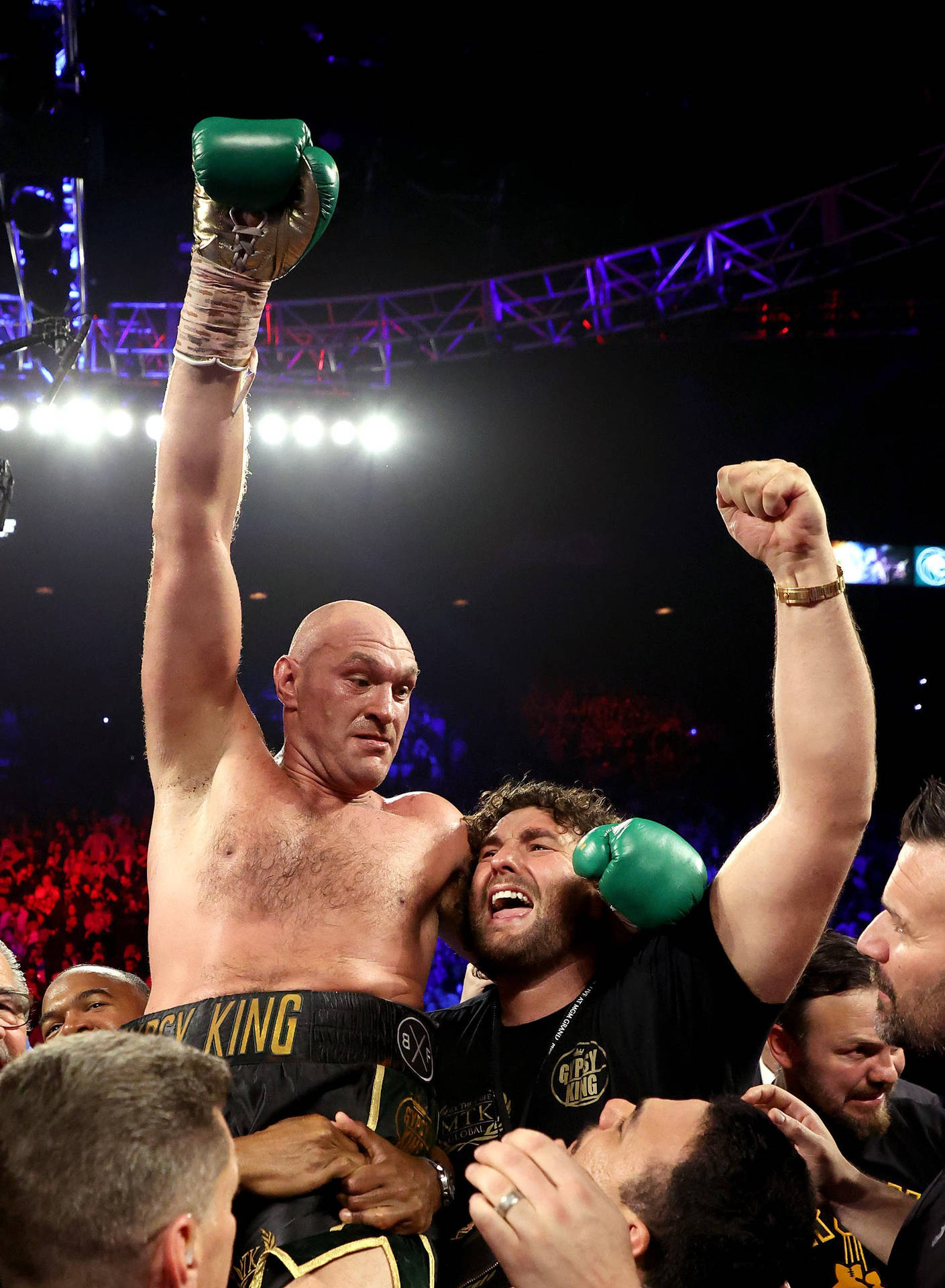 Tyson Fury Lifting Arms For Victory Background