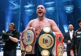 Tyson Fury Shouting For His Victory Background