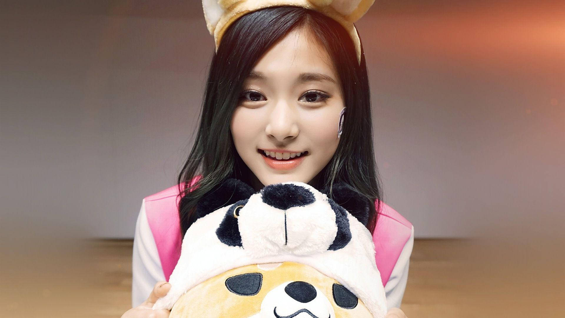 Tzuyu With Cute Stuffed Toy Background