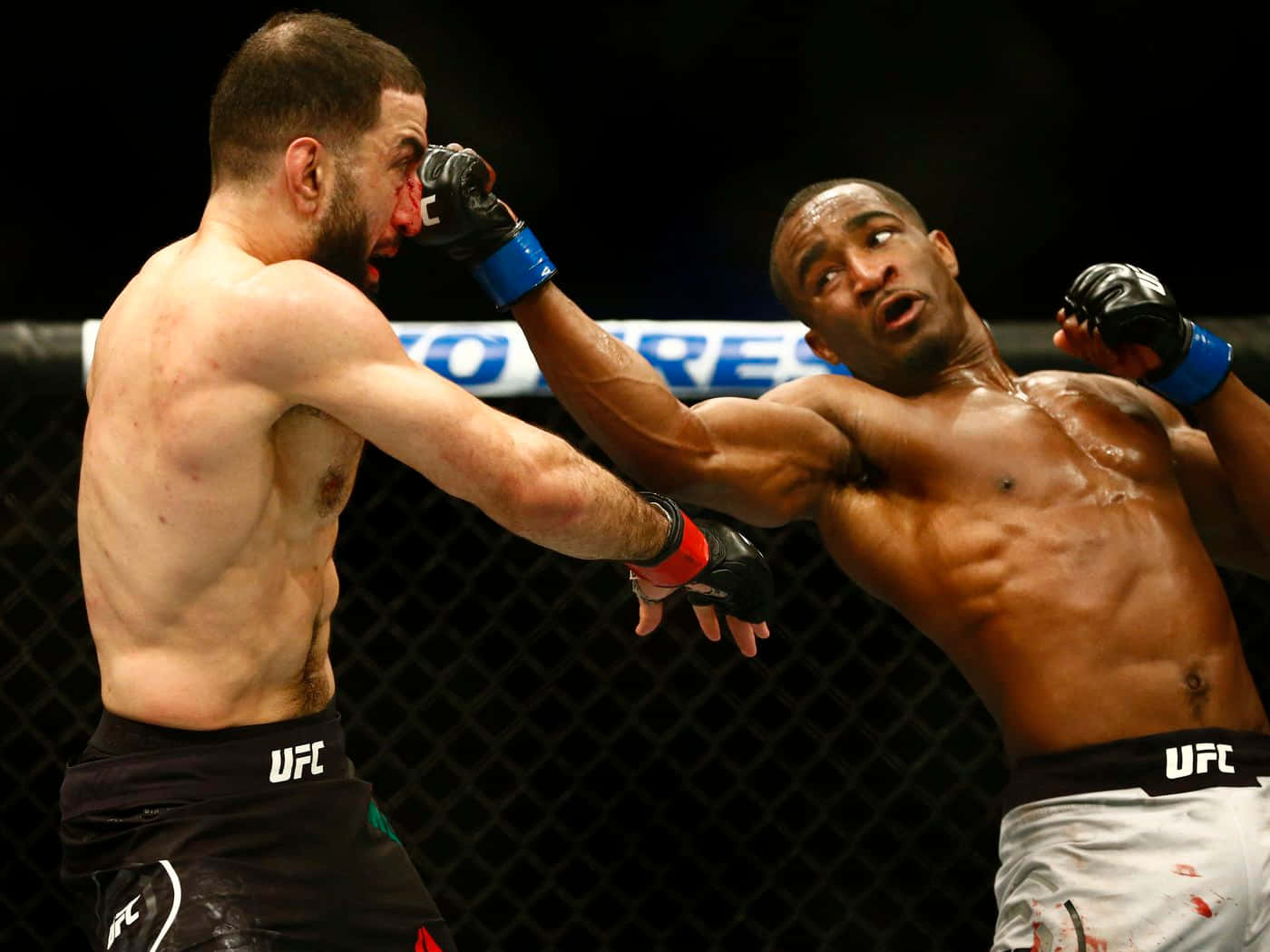 U F C Fighter Geoff Neal Lands Punch Background