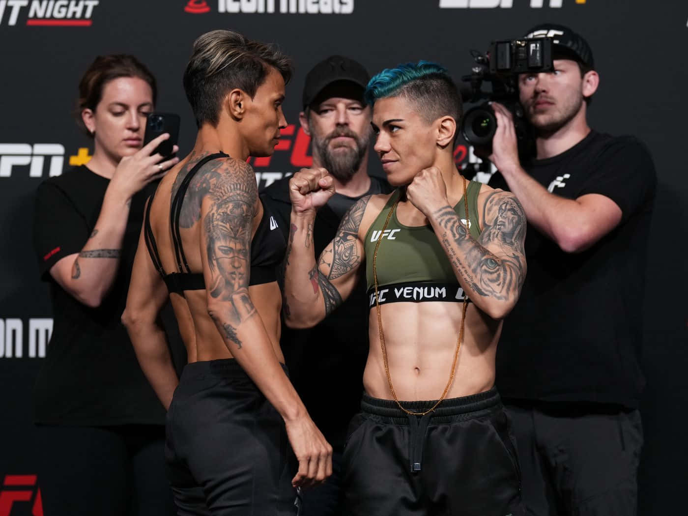 U F C Fighters Faceoff Staredown Background