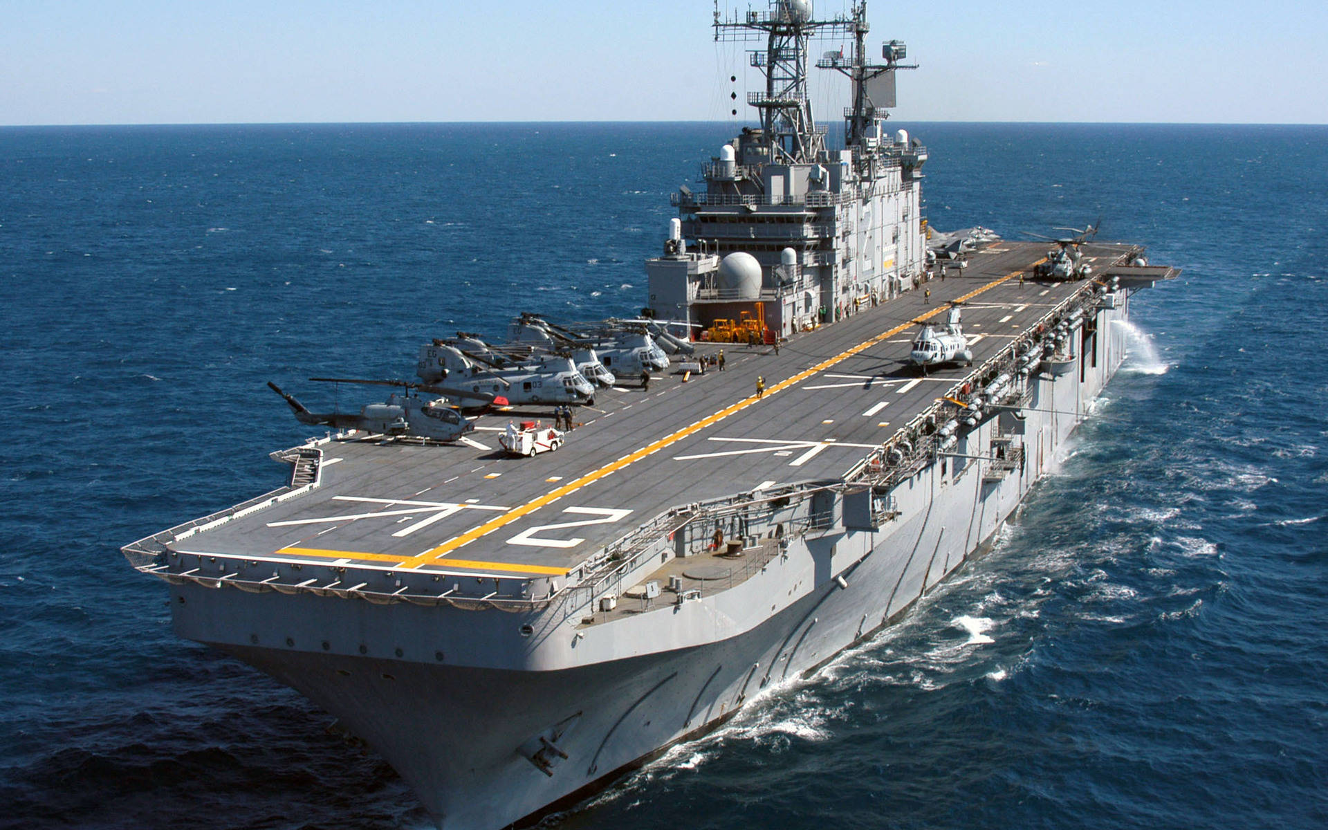 U S Navy Assault Ship At Sea Background