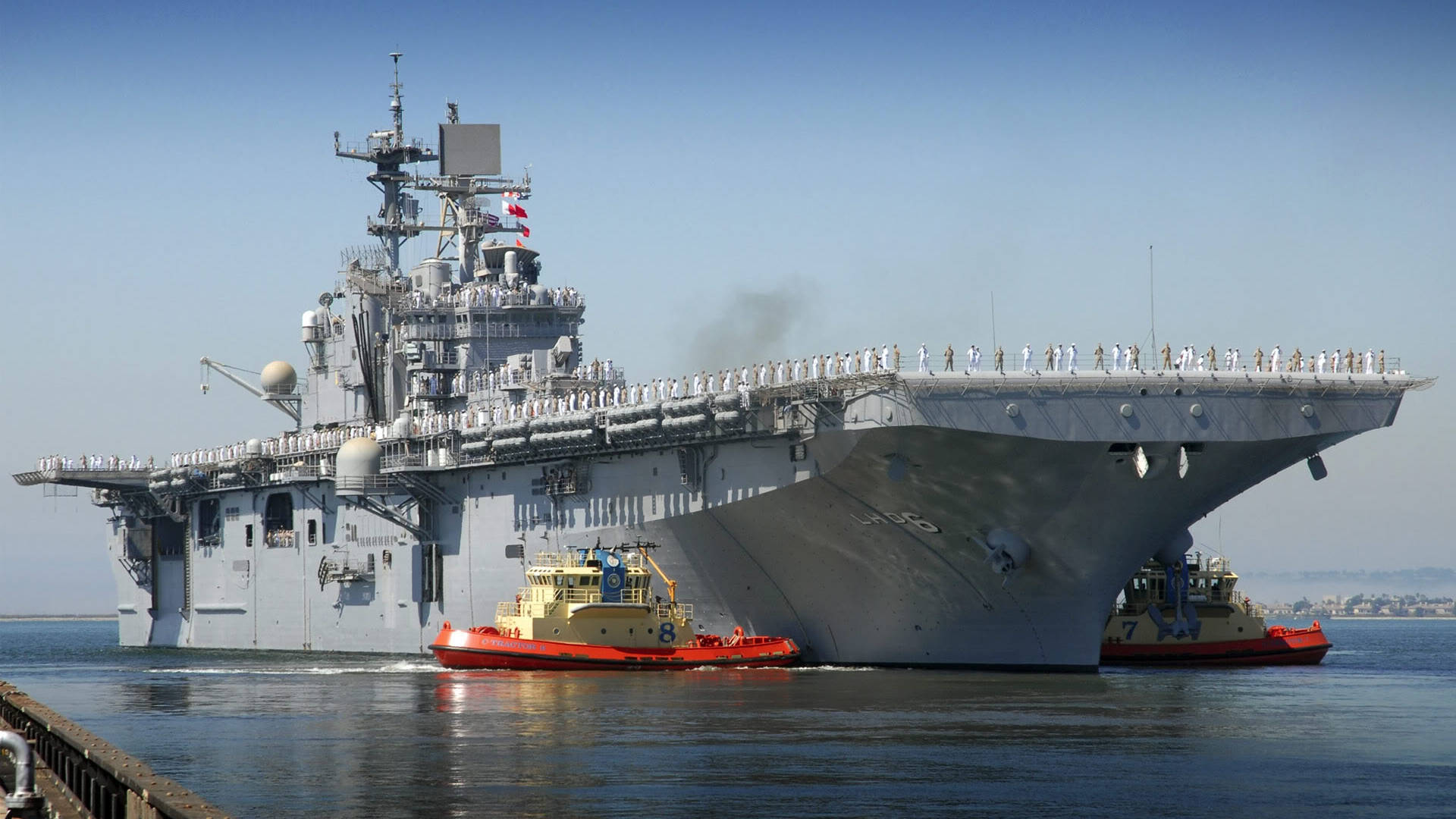 U S Navy Assault Ship Being Towed Background