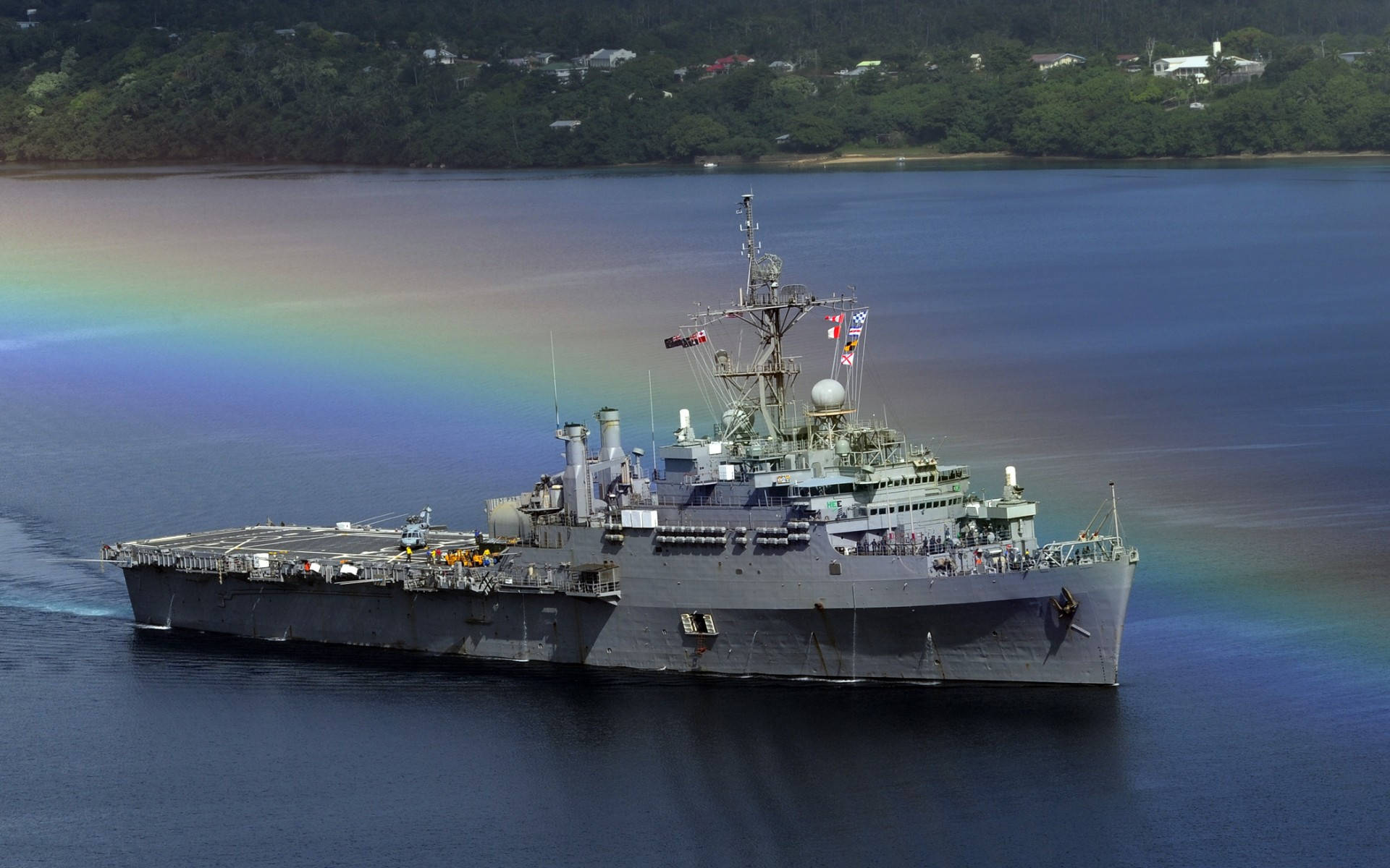 U S Navy Ship Behind A Rainbow Background