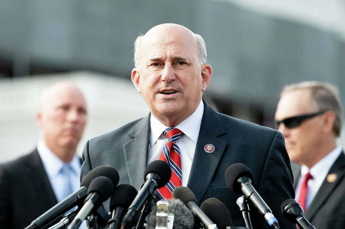 U.s. Representative Louie Gohmert Addressing Multiple Microphones. Background