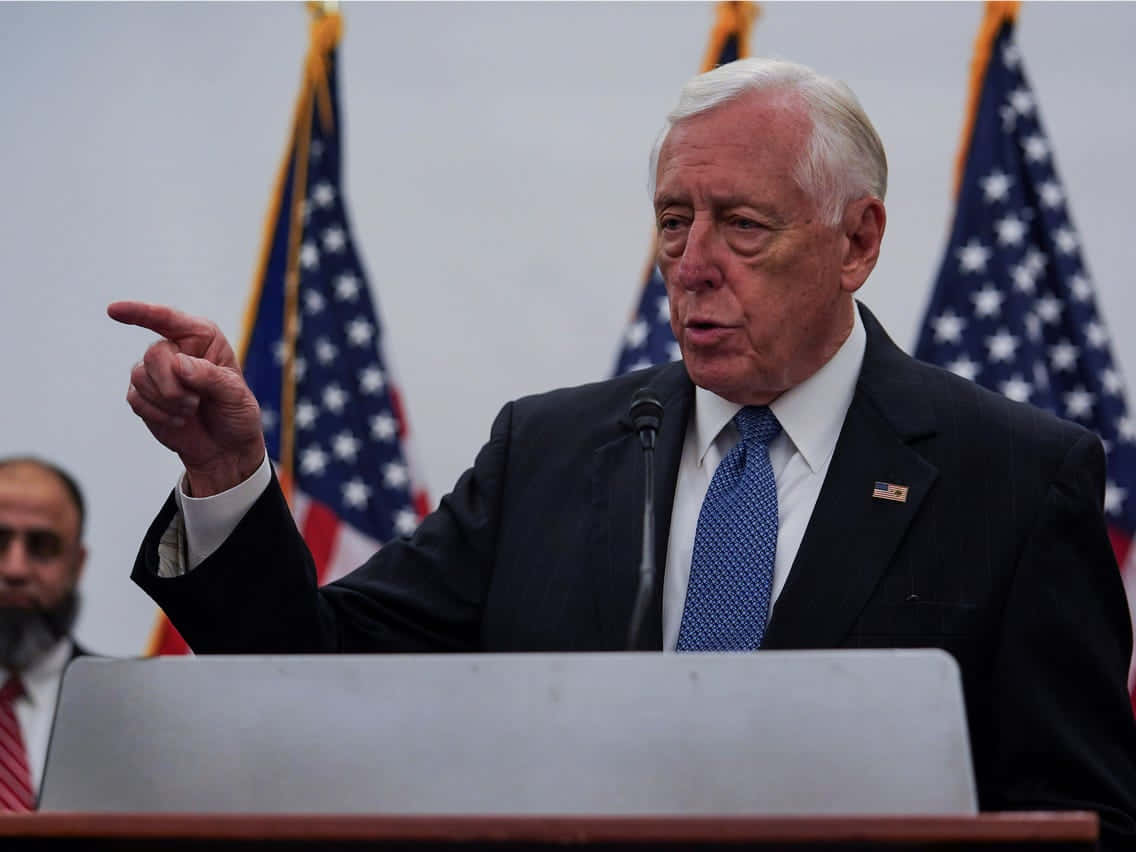 U.s. Representative Steny Hoyer Expressively Addressing An Issue Background