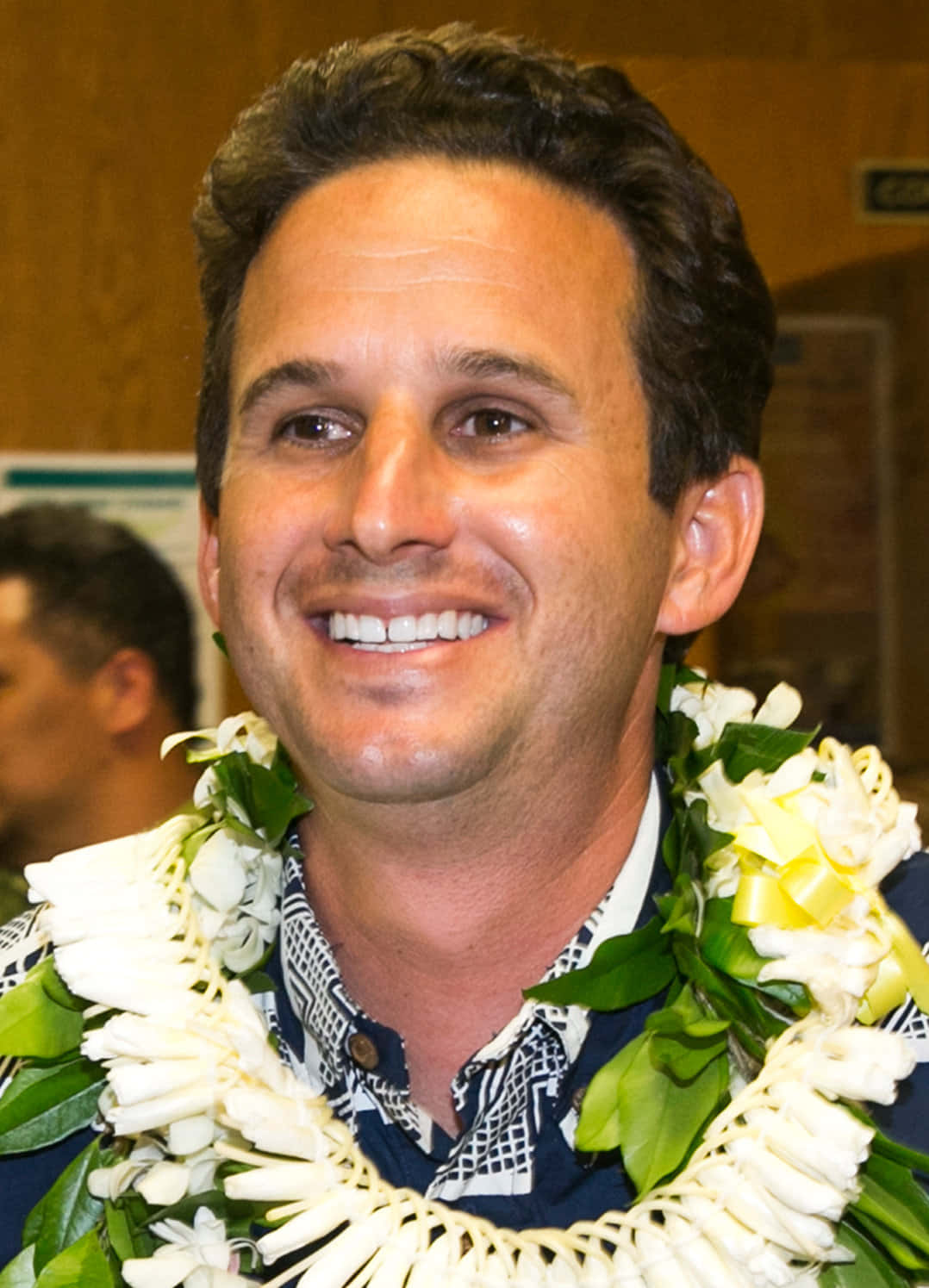 U.s. Senator Brian Schatz Flashing A Wide Grin Background