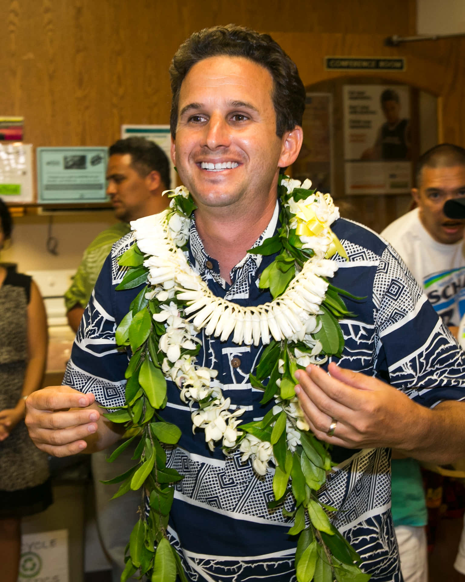 U.s. Senator Brian Schatz Wearing A Traditional Hawaiian Flower Wreath. Background
