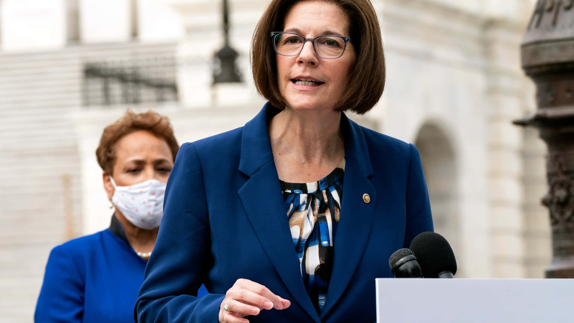 U.s. Senator Catherine Cortez Masto In Discussion Background