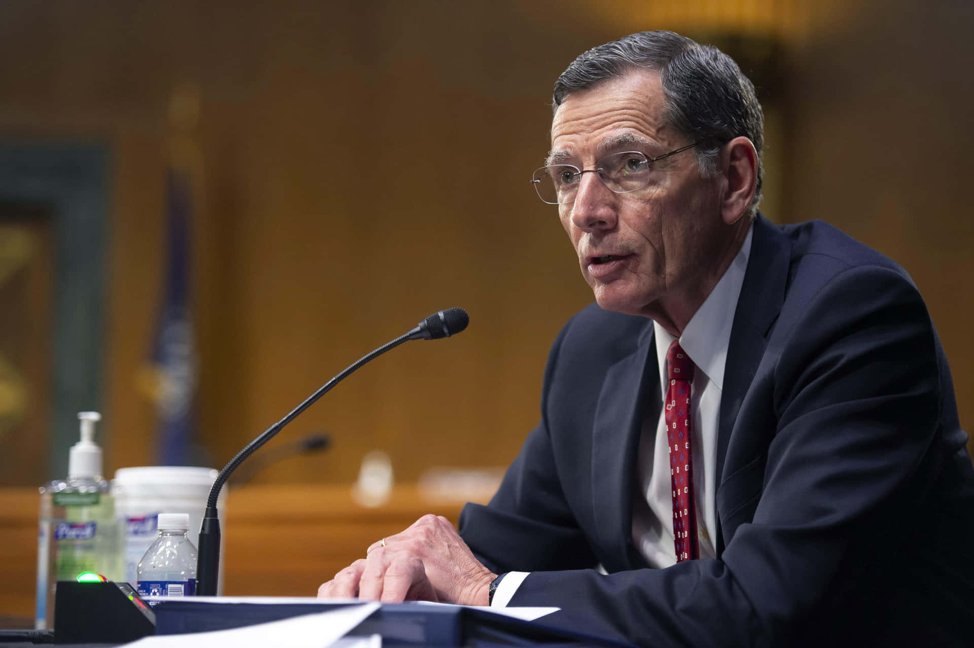 U.s. Senator John Barrasso Delivering A Speech. Background