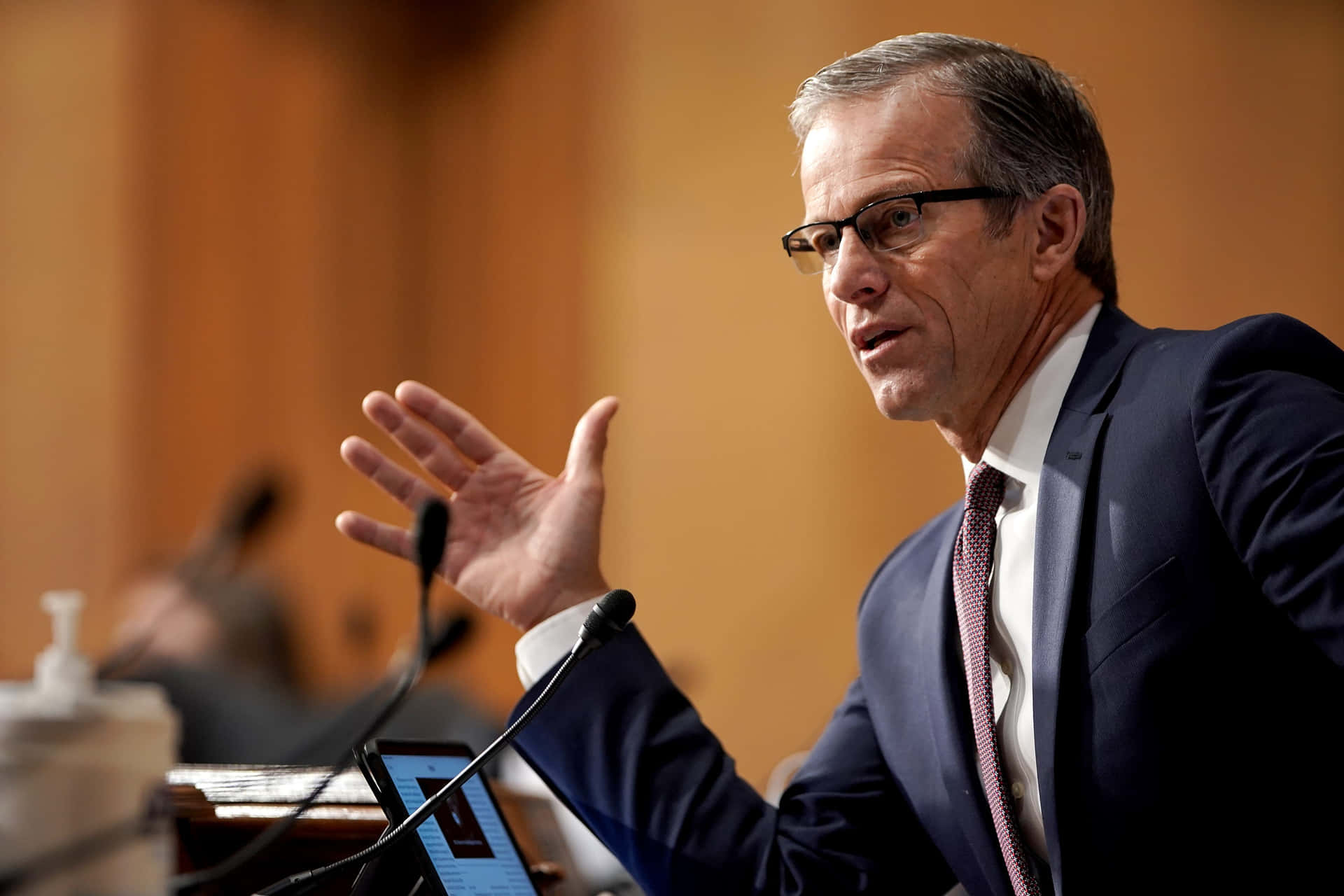 U.s. Senator John Thune Pondering Deeply In Glasses Background