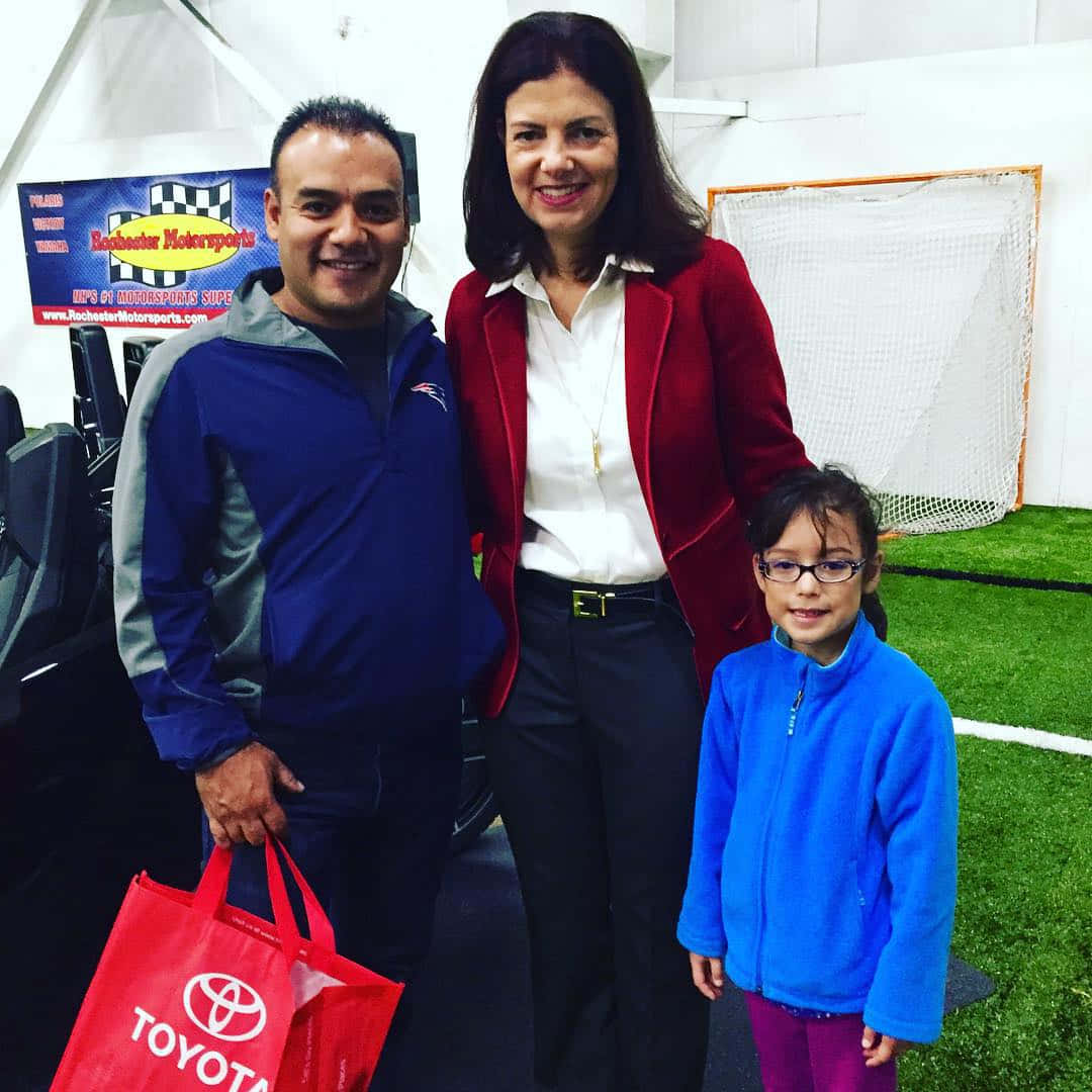 U.s. Senator Kelly Ayotte Standing With Supporters At Her Political Rally In New Hampshire. Background