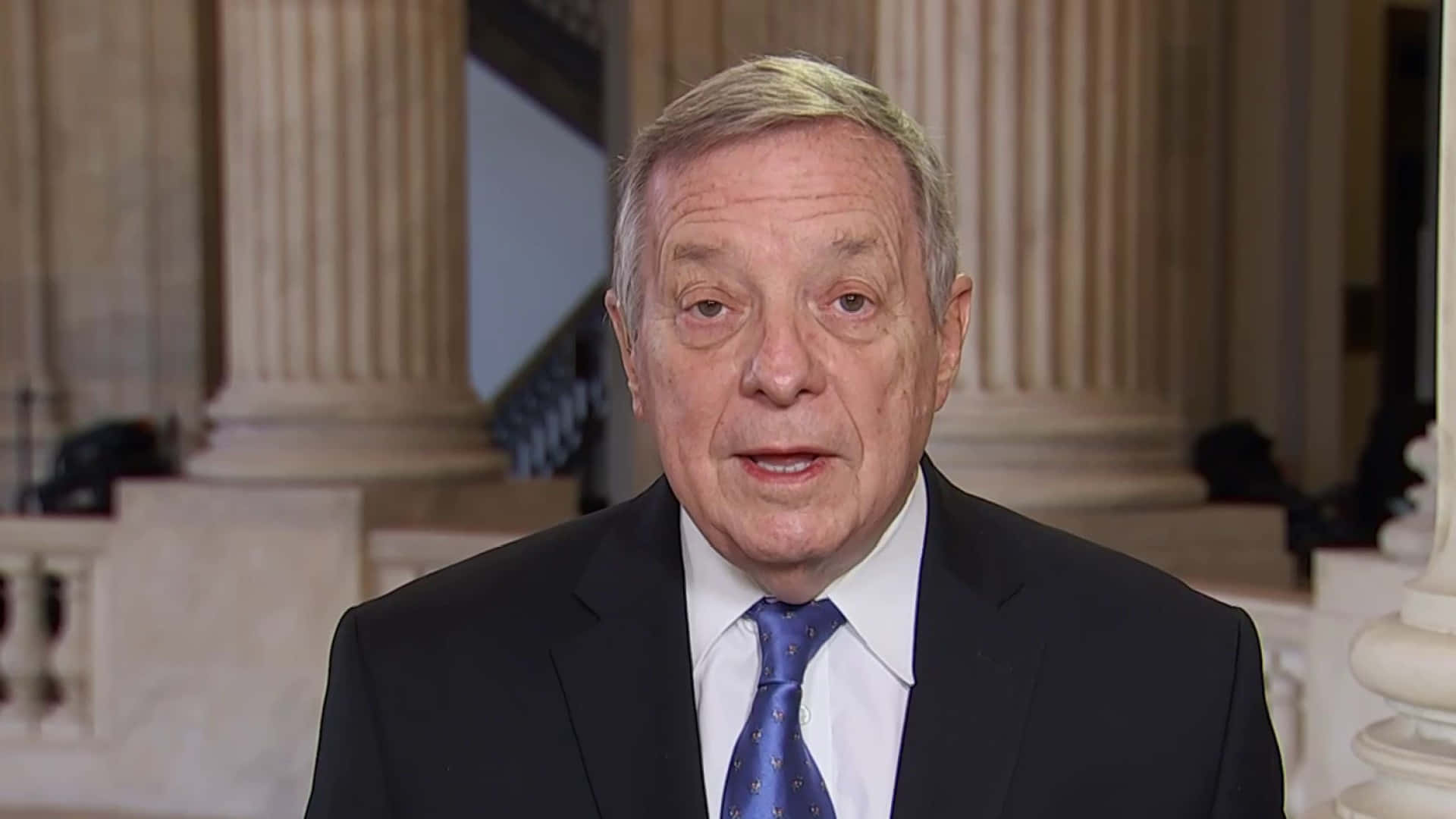U.s. Senator Richard Durbin In Formal Attire Background