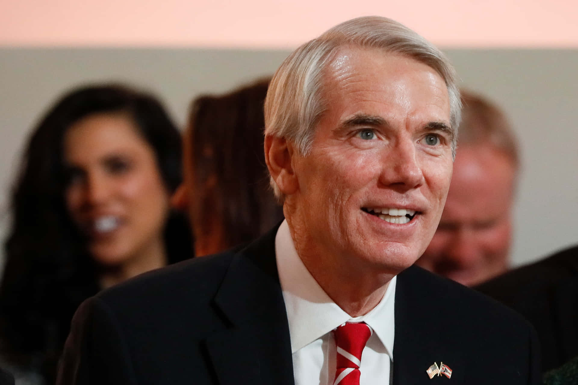 U.s. Senator Rob Portman Smiling During A Discussion Background