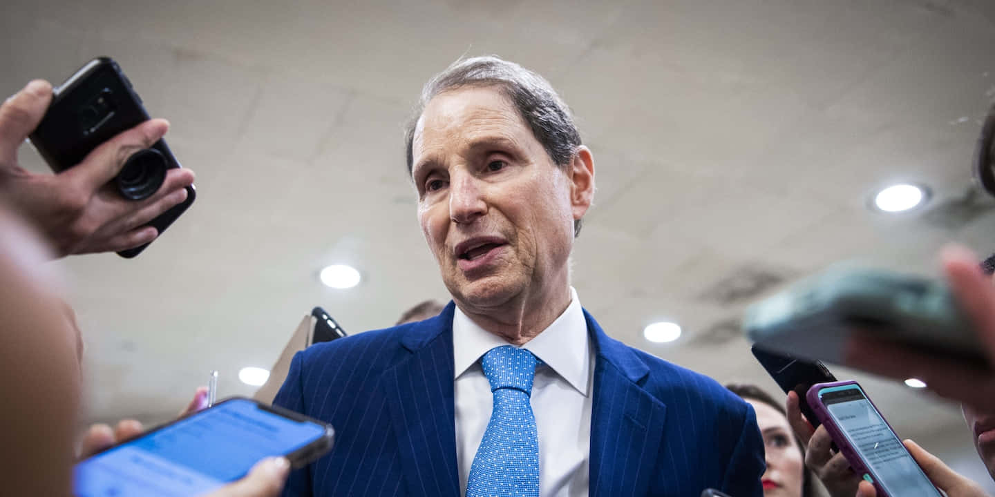 U.s. Senator Ron Wyden Engaged In An Interview Background
