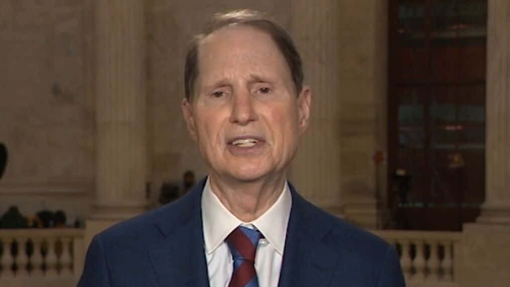 U.s. Senator Ron Wyden In Deep Discussion Background