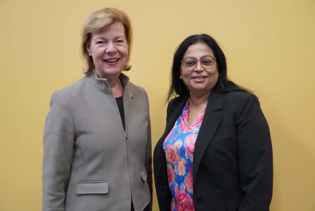 U.s. Senator Tammy Baldwin In A Classy Gray Coat Background