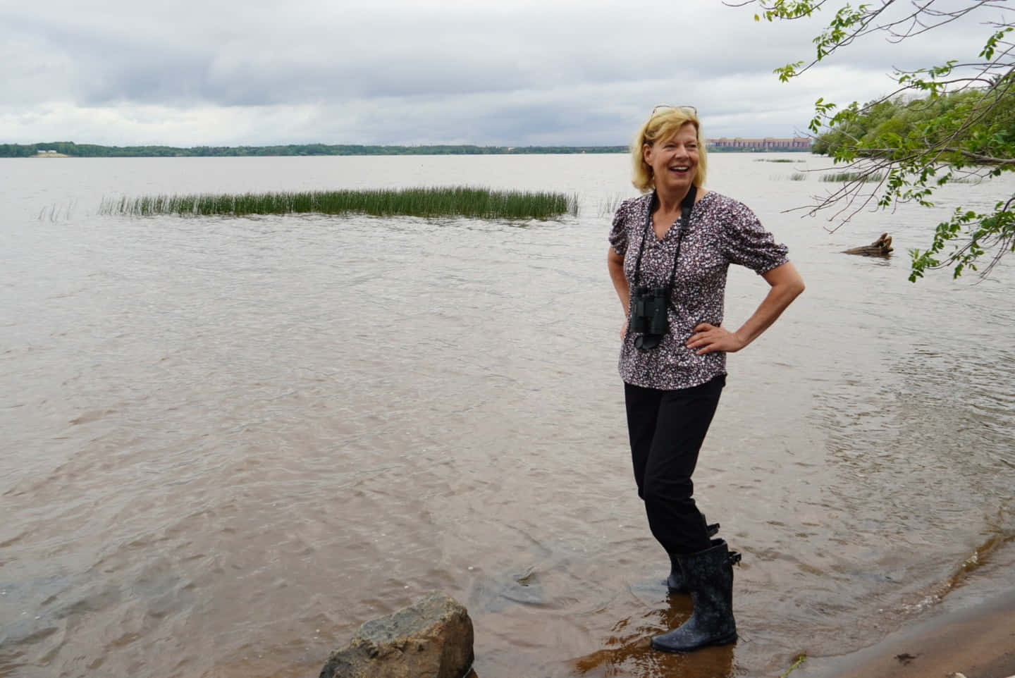 U.s. Senator Tammy Baldwin In Wading Boots Background