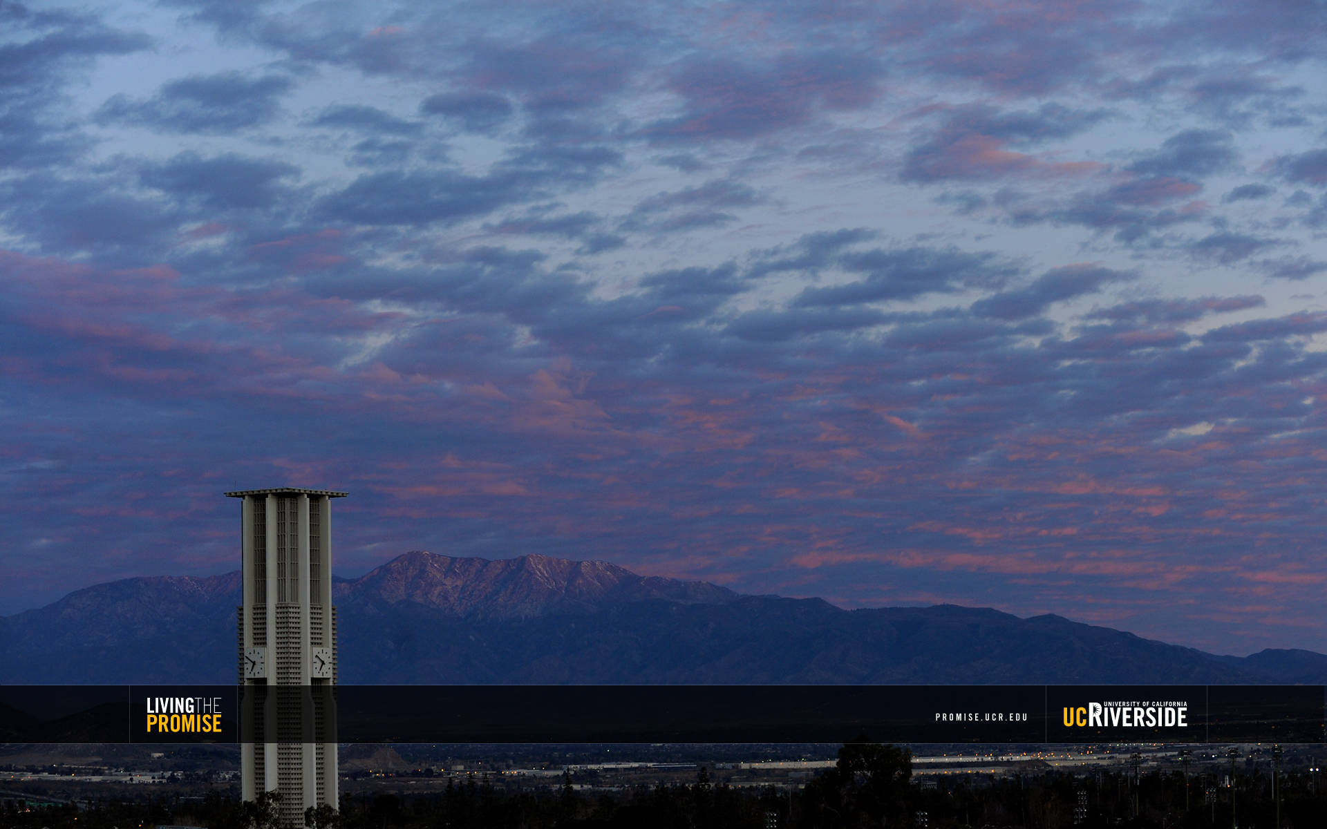 Ucr Bell Tower Under Cloudy Sky Background