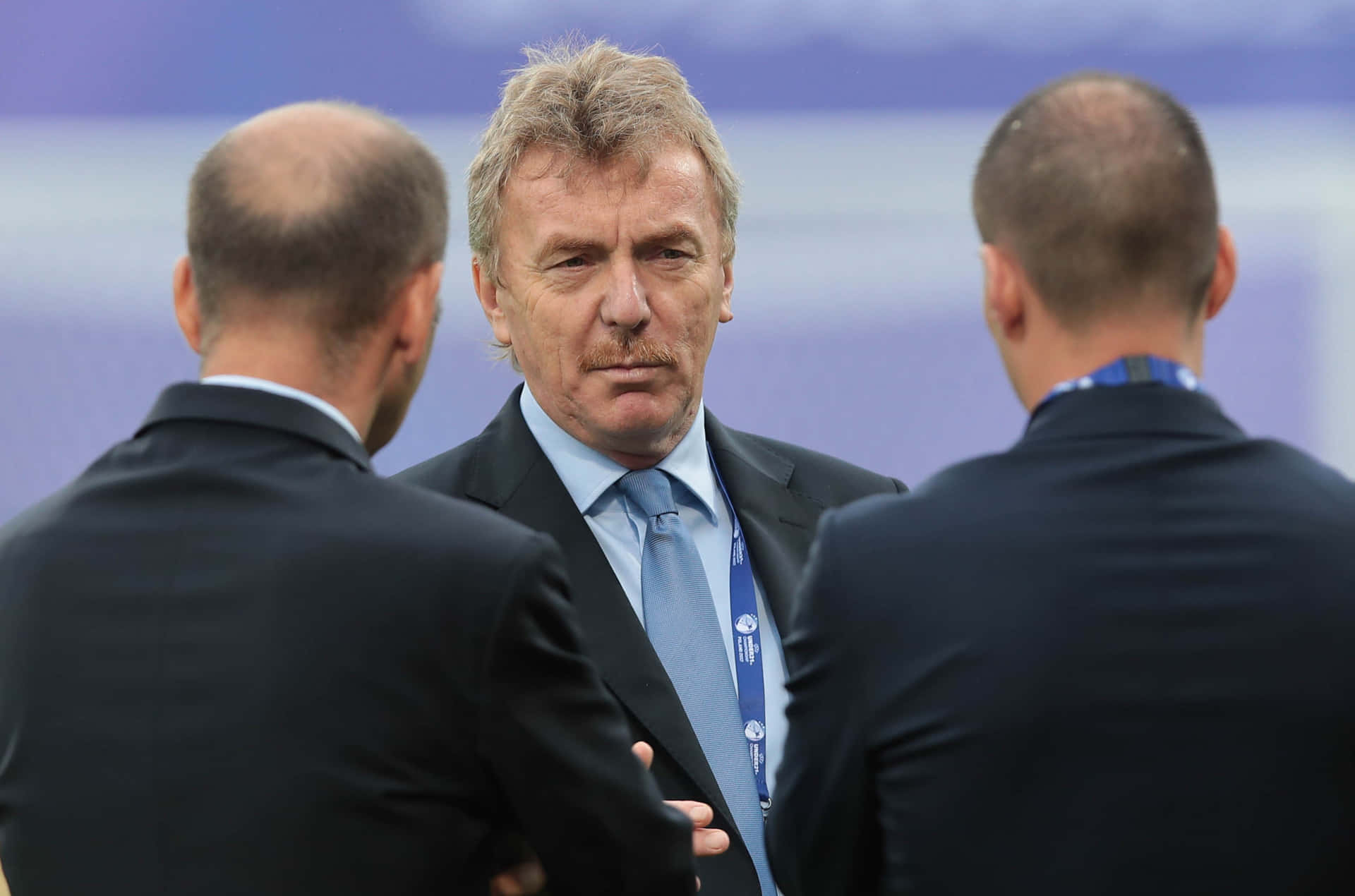 Uefa Vice President Zbigniew Boniek Conversing With Two Men Background