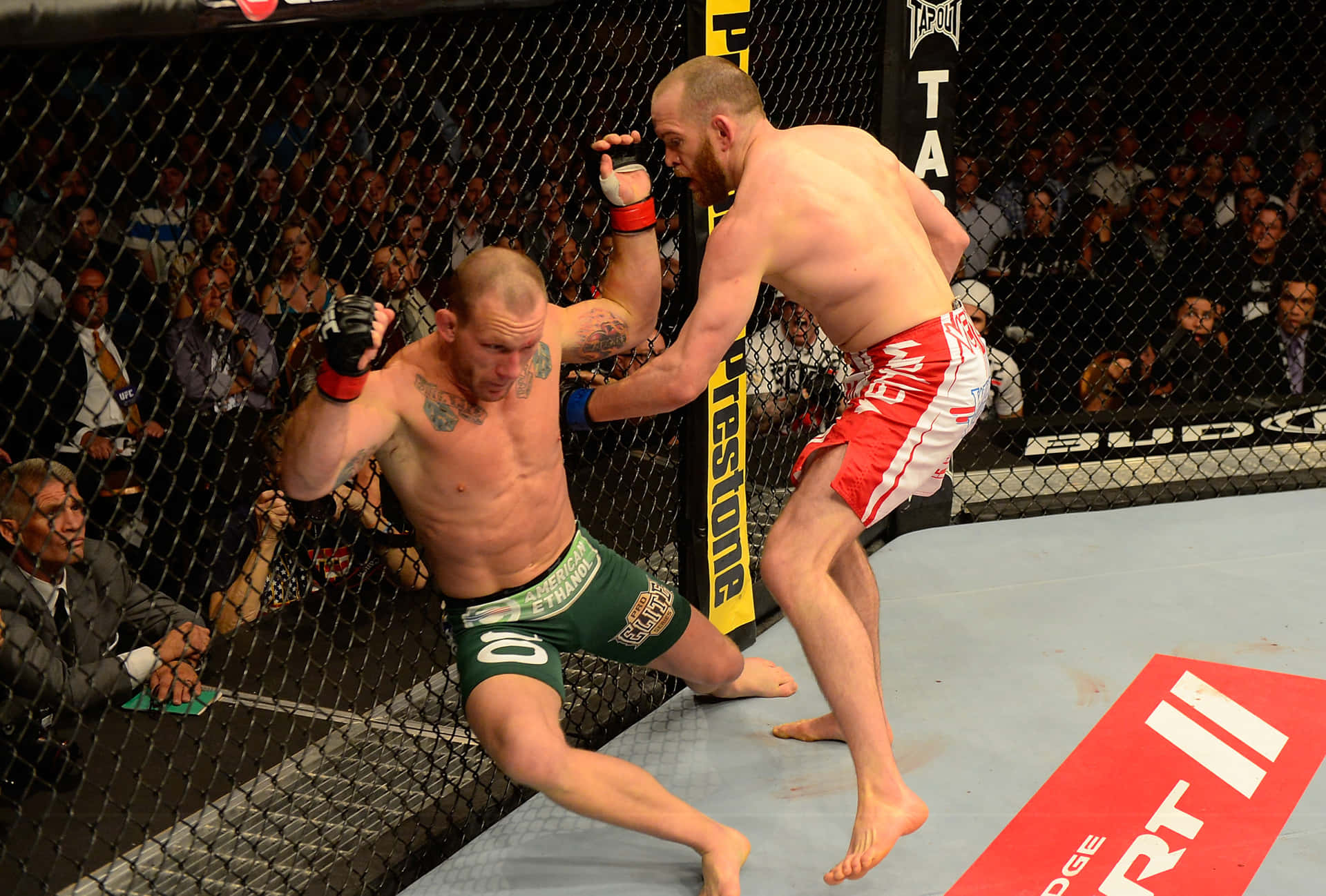 Ufc Fight Gray Maynard And T.j. Grant Background