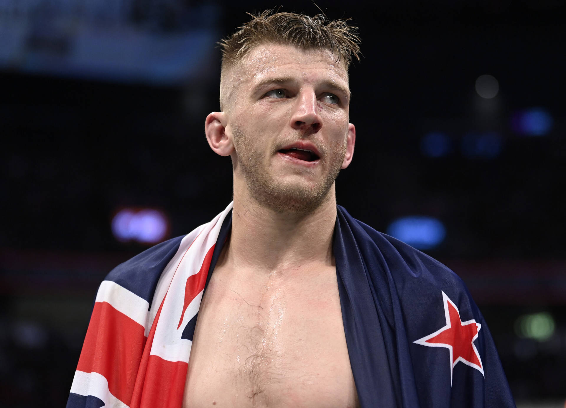 Ufc Fighter Dan Hooker Proudly Holding Flag