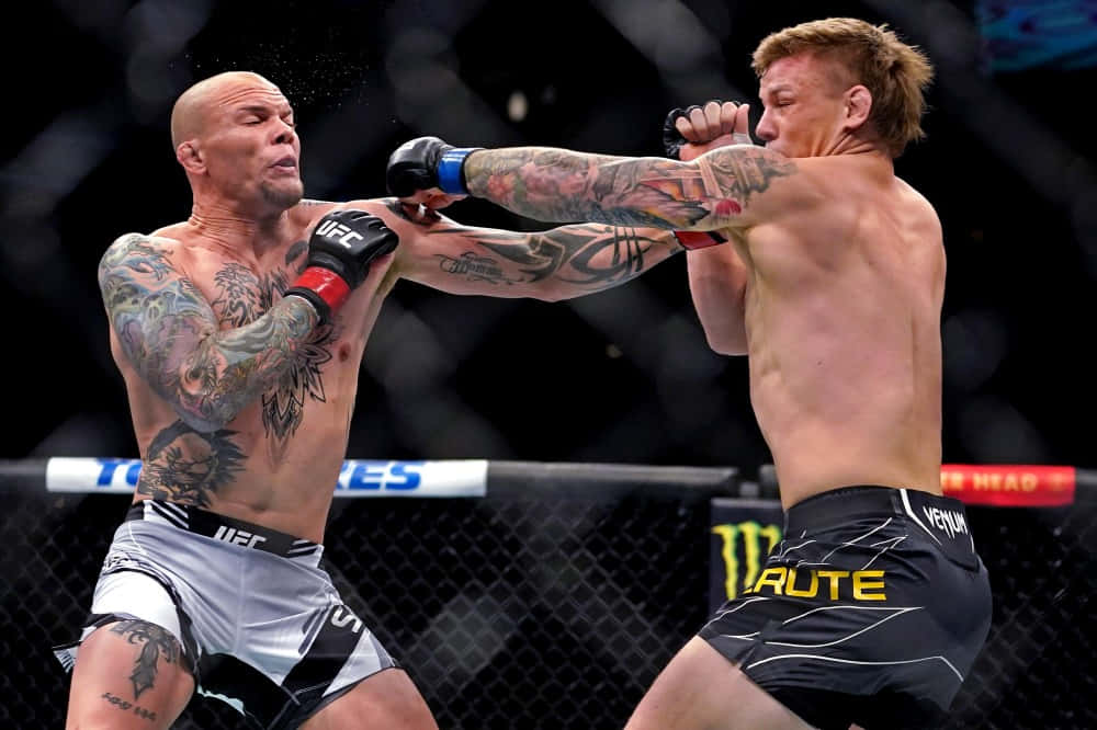 Ufc Fighter Jimmy Crute Throwing Punches Background