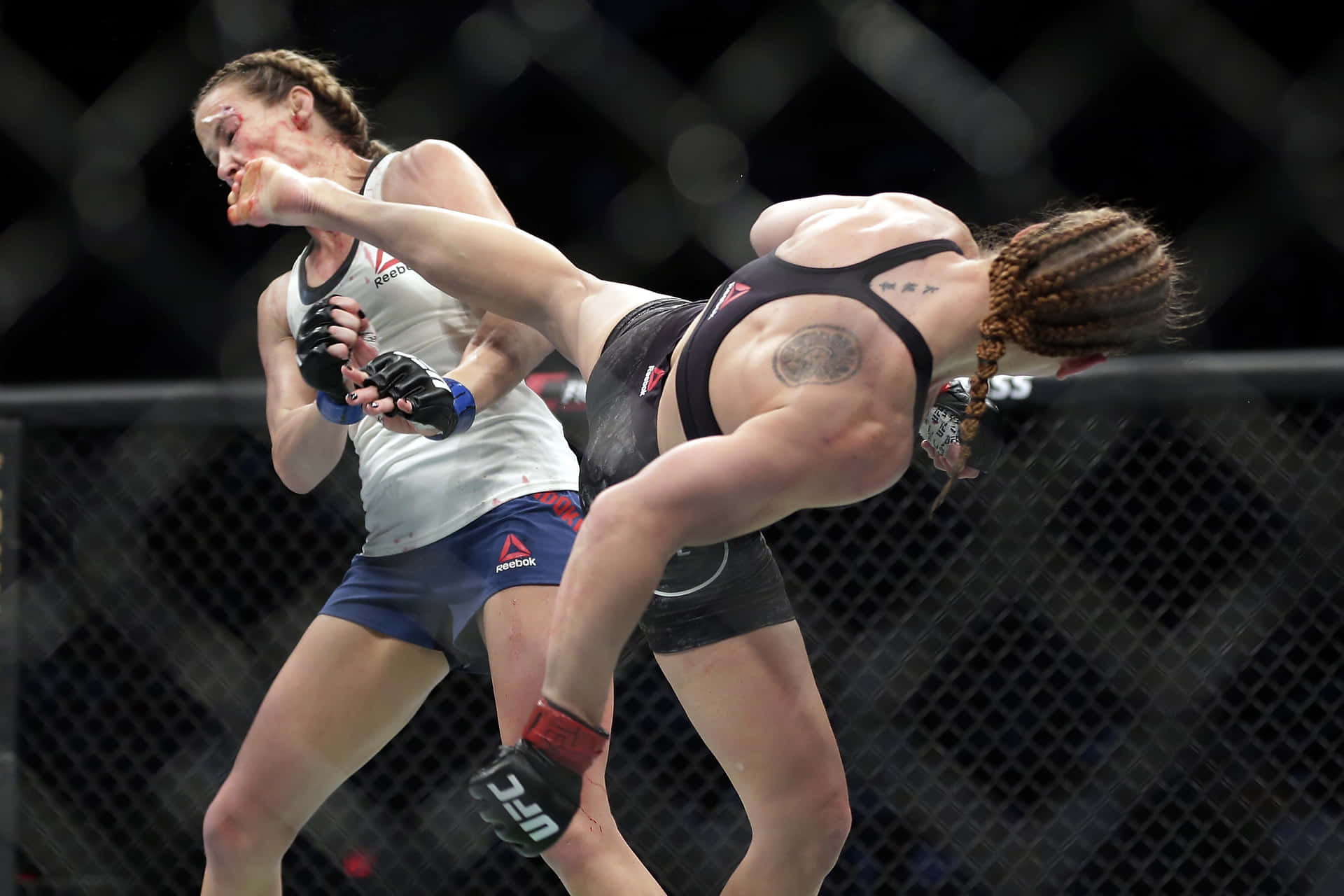 Ufc Fighter Katlyn Chookagian Delivering A Powerful Kick Background