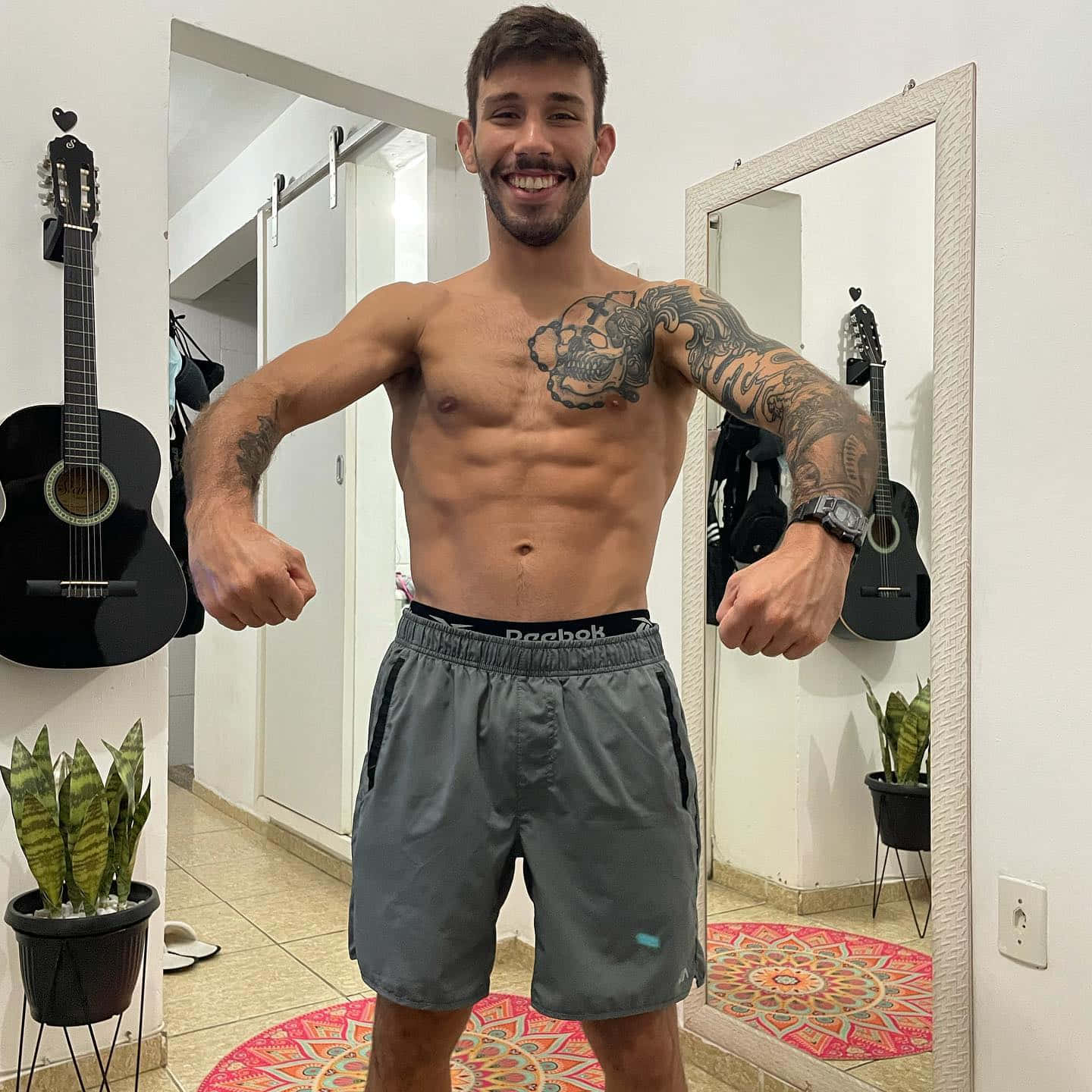 Ufc Fighter Matheus Nicolau Performing A Front Lat Spread Background