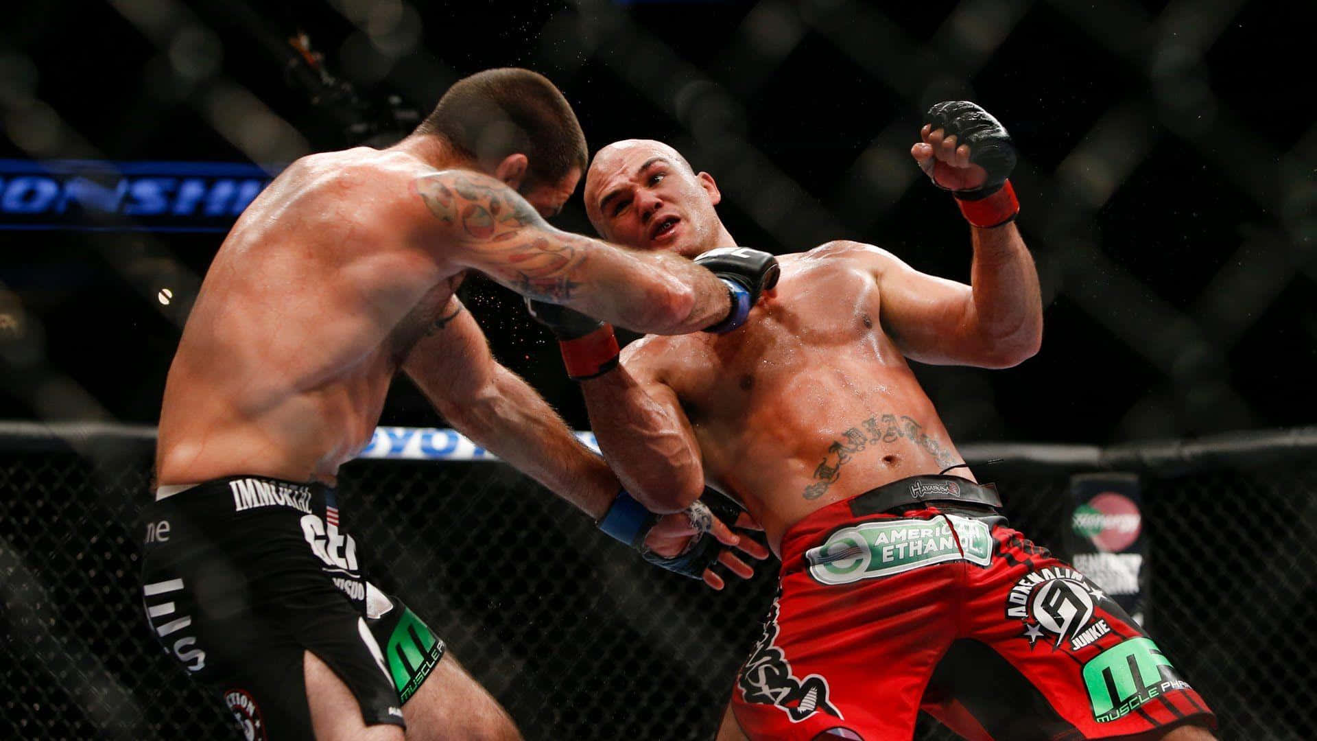 Ufc Fighter Robbie Lawler Skillfully Dodges An Attack