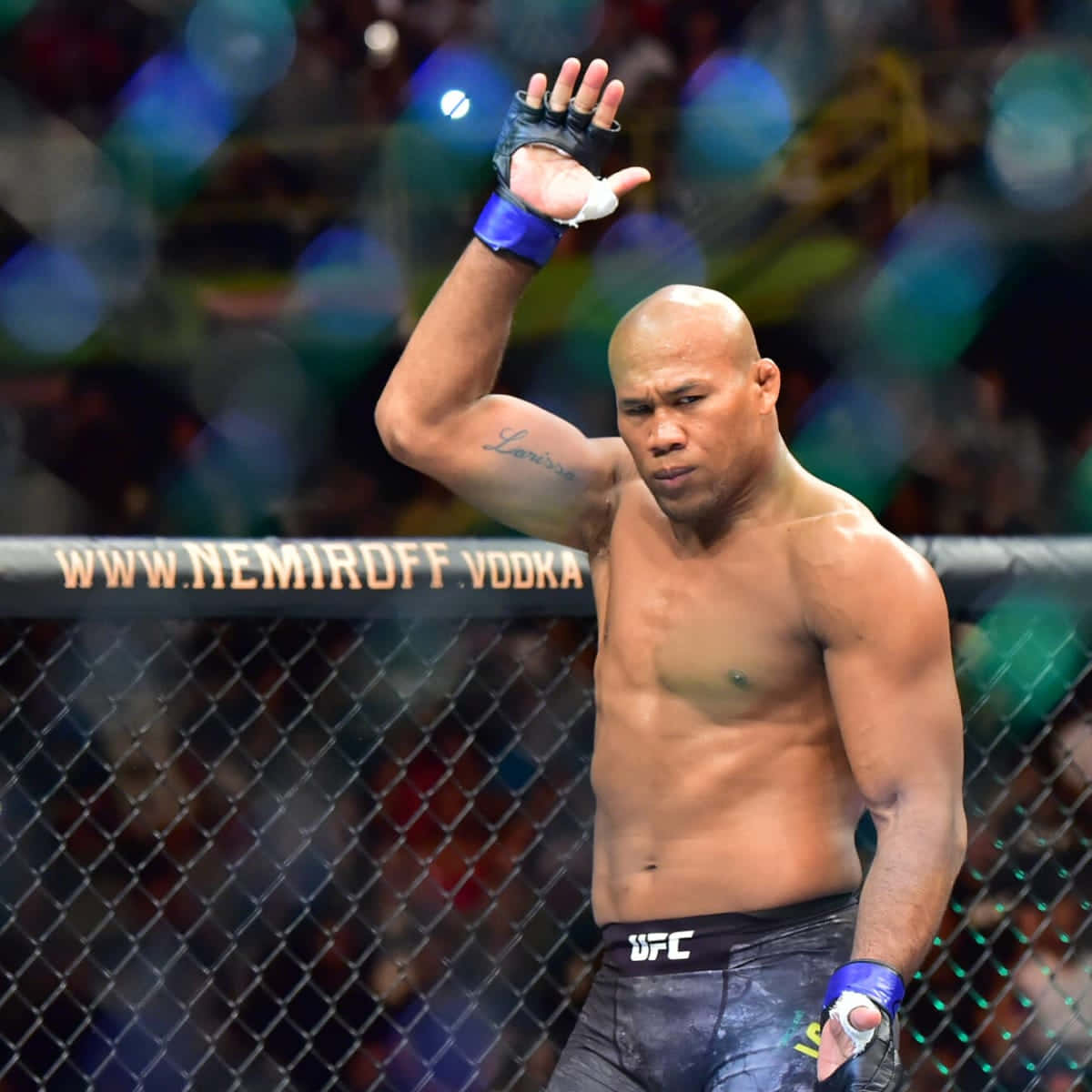 Ufc Fighter Ronaldo Souza With Hand Raised Background