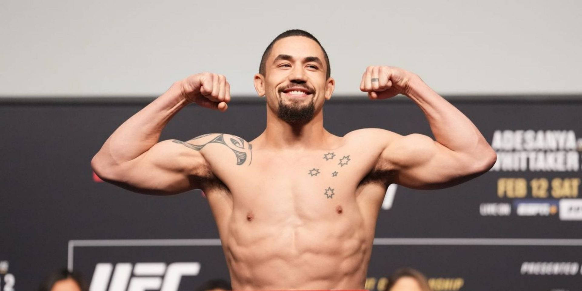 Ufc Star Robert Whittaker Showing Off His Fighting Strength. Background