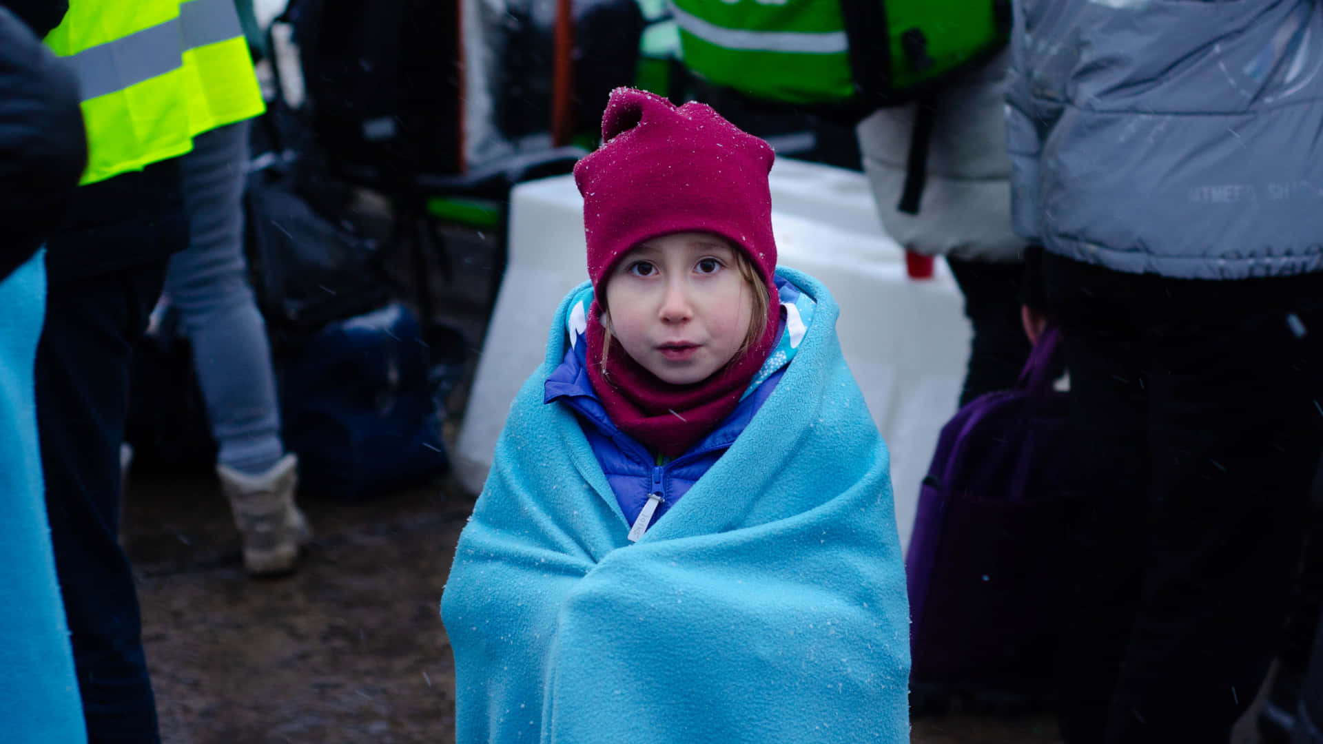 Ukrainian Girl With A Blanket Disaster Situation Background